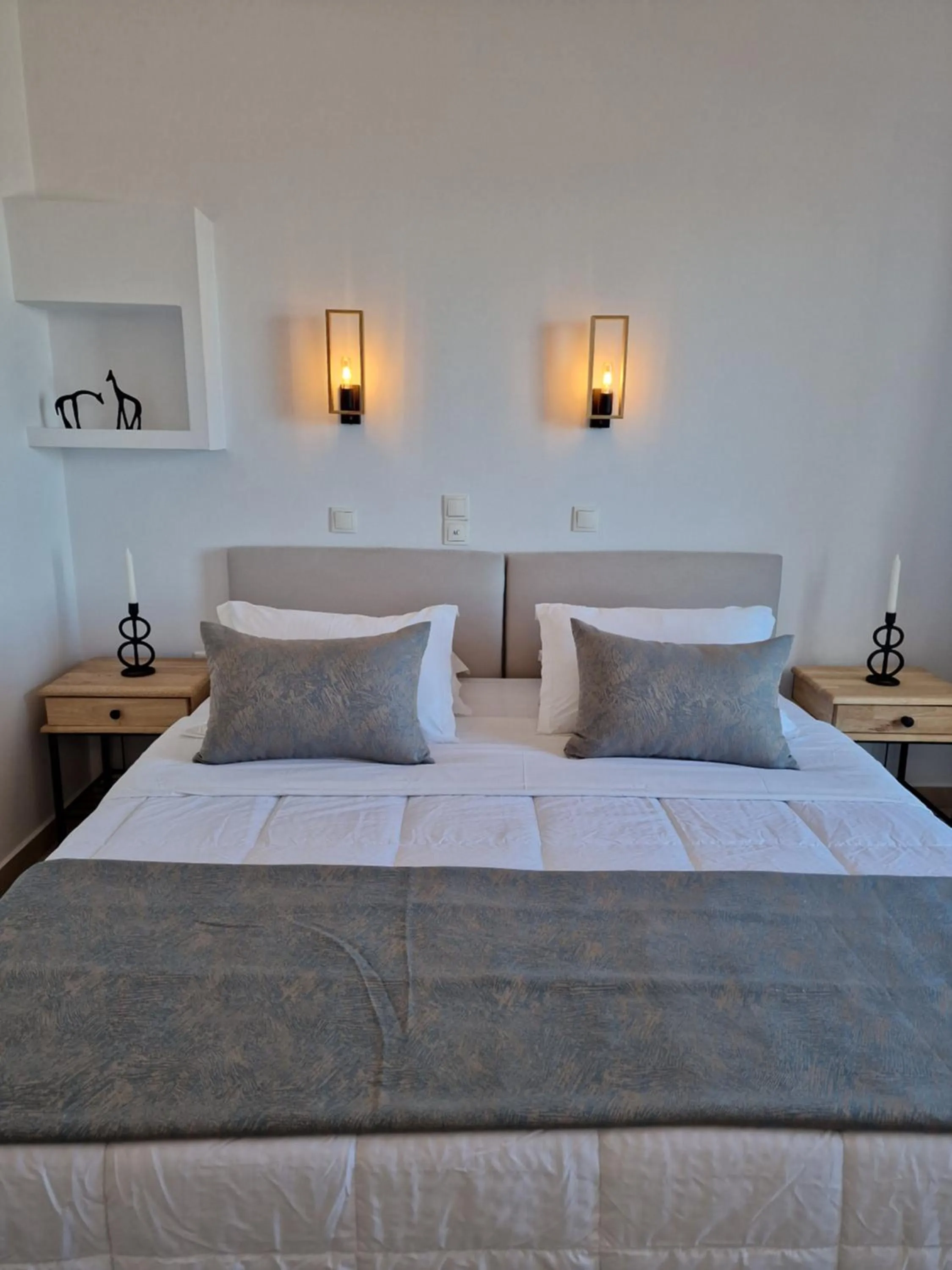 Bed in Amerisa Suites & Villa