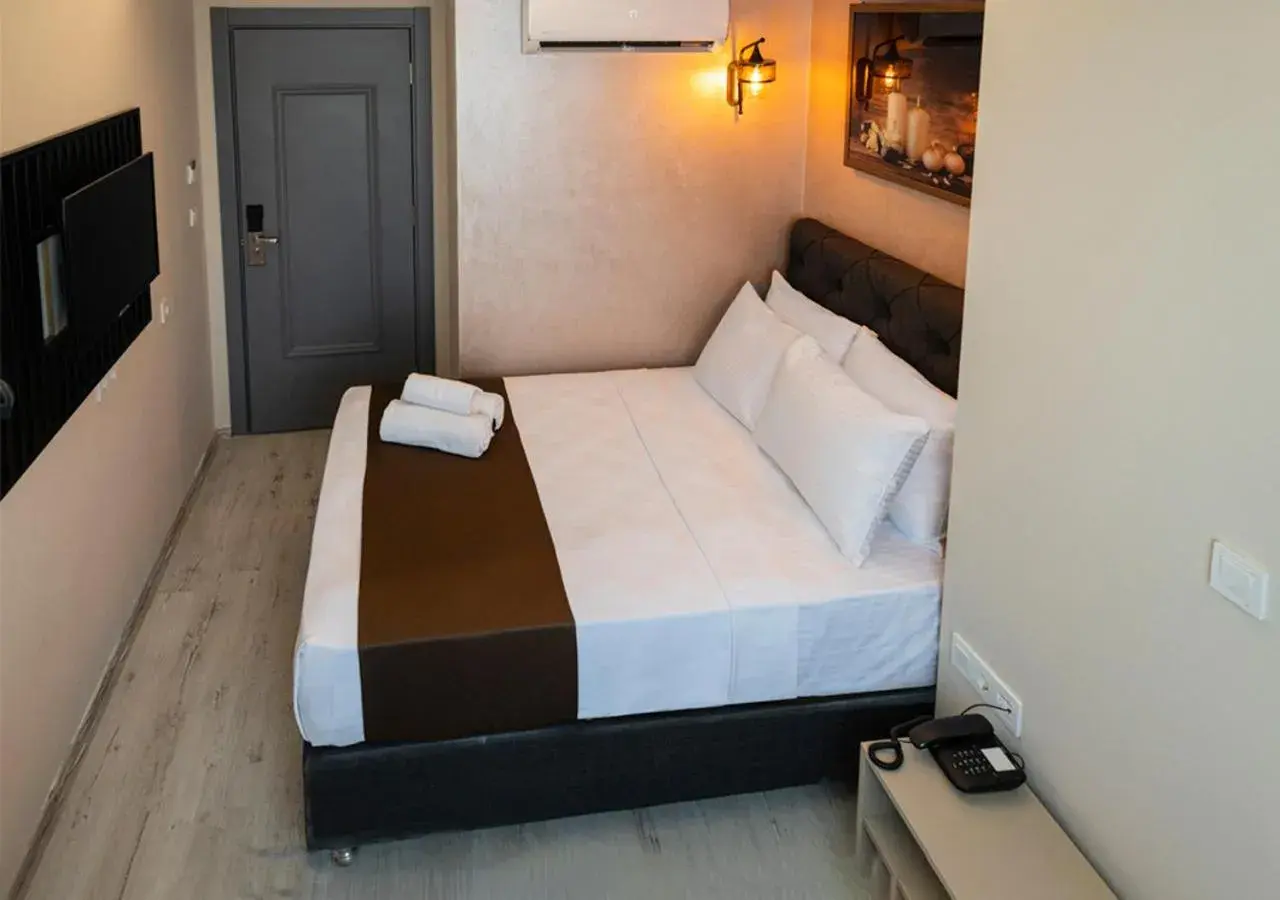 Bed in MONEZZA HOTEL MALTEPE