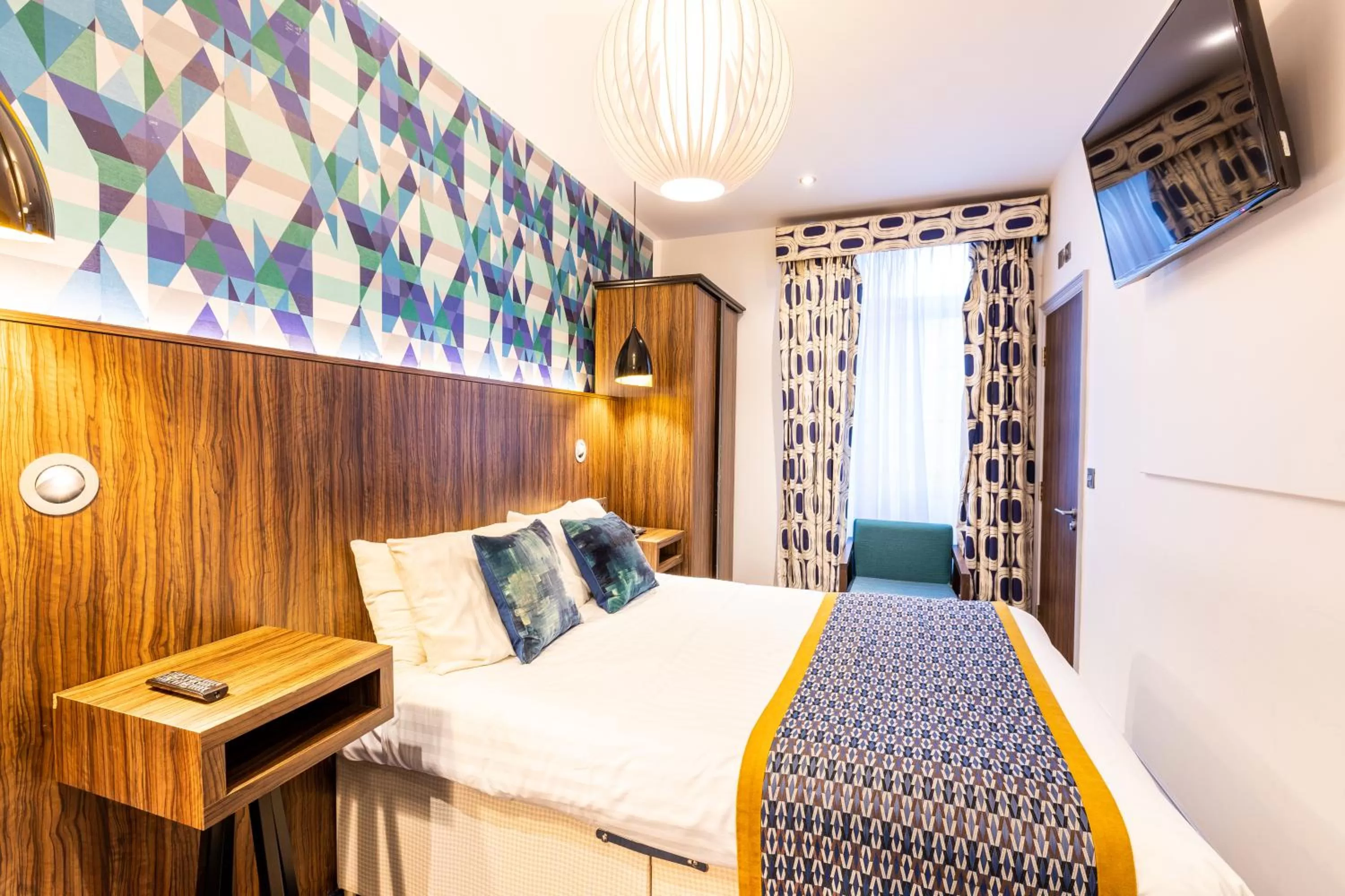 Bed in Cairn Hotel & Apartments