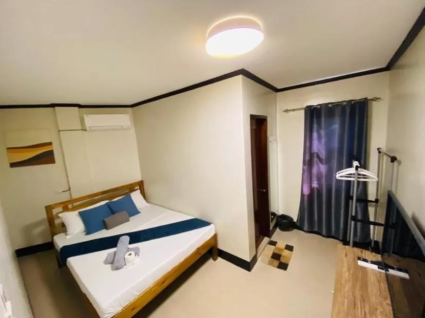 Bed in Mongki's Pensionhouse