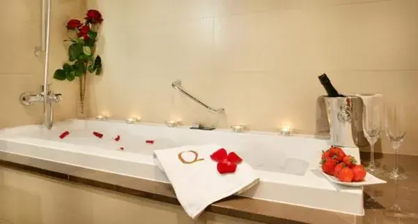 Bathroom in Qgat Restaurant Events & Hotel
