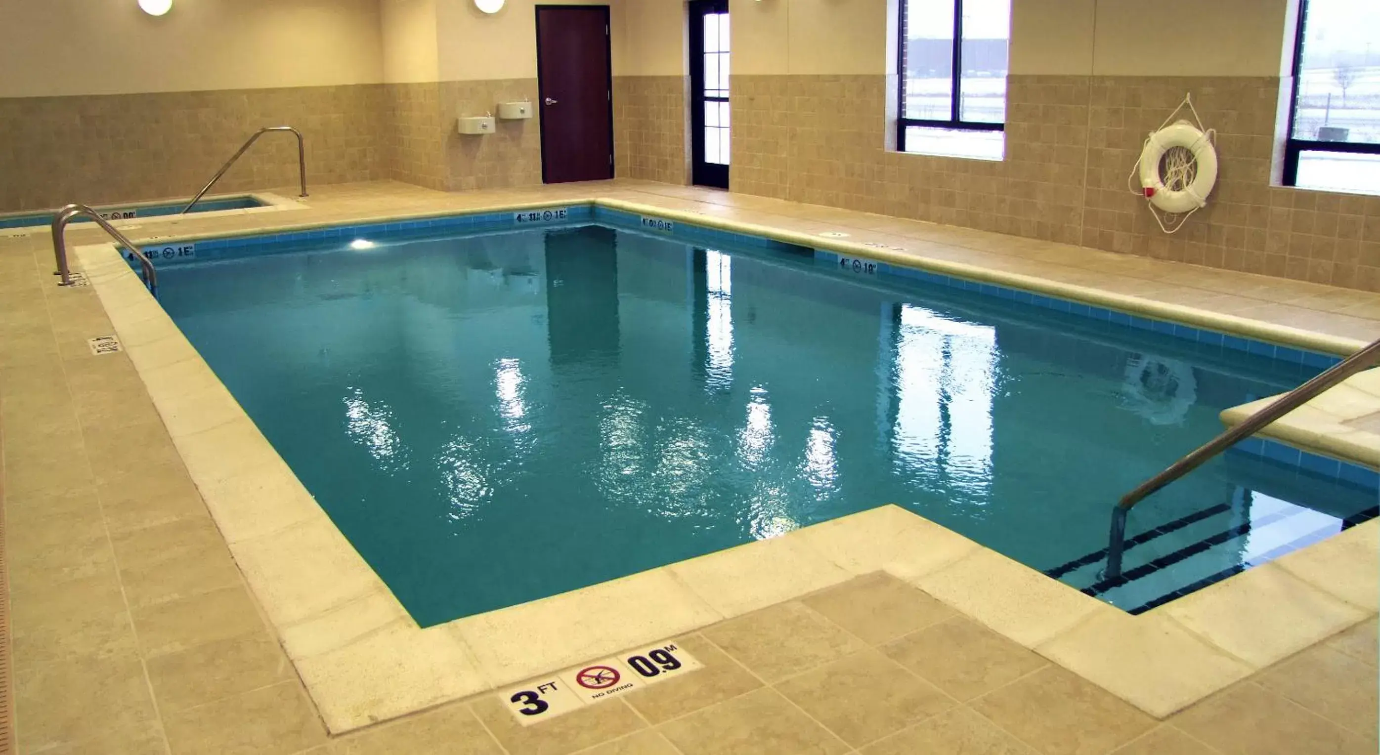 Swimming Pool in Holiday Inn Express & Suites Morton Peoria Area, an IHG Hotel