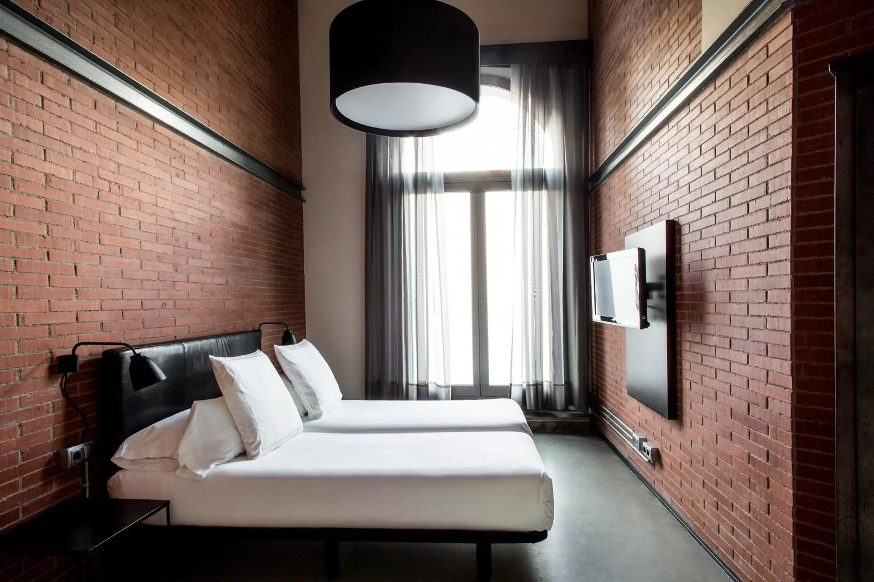 Bed, Seating Area in Barcelona Apartment Republica