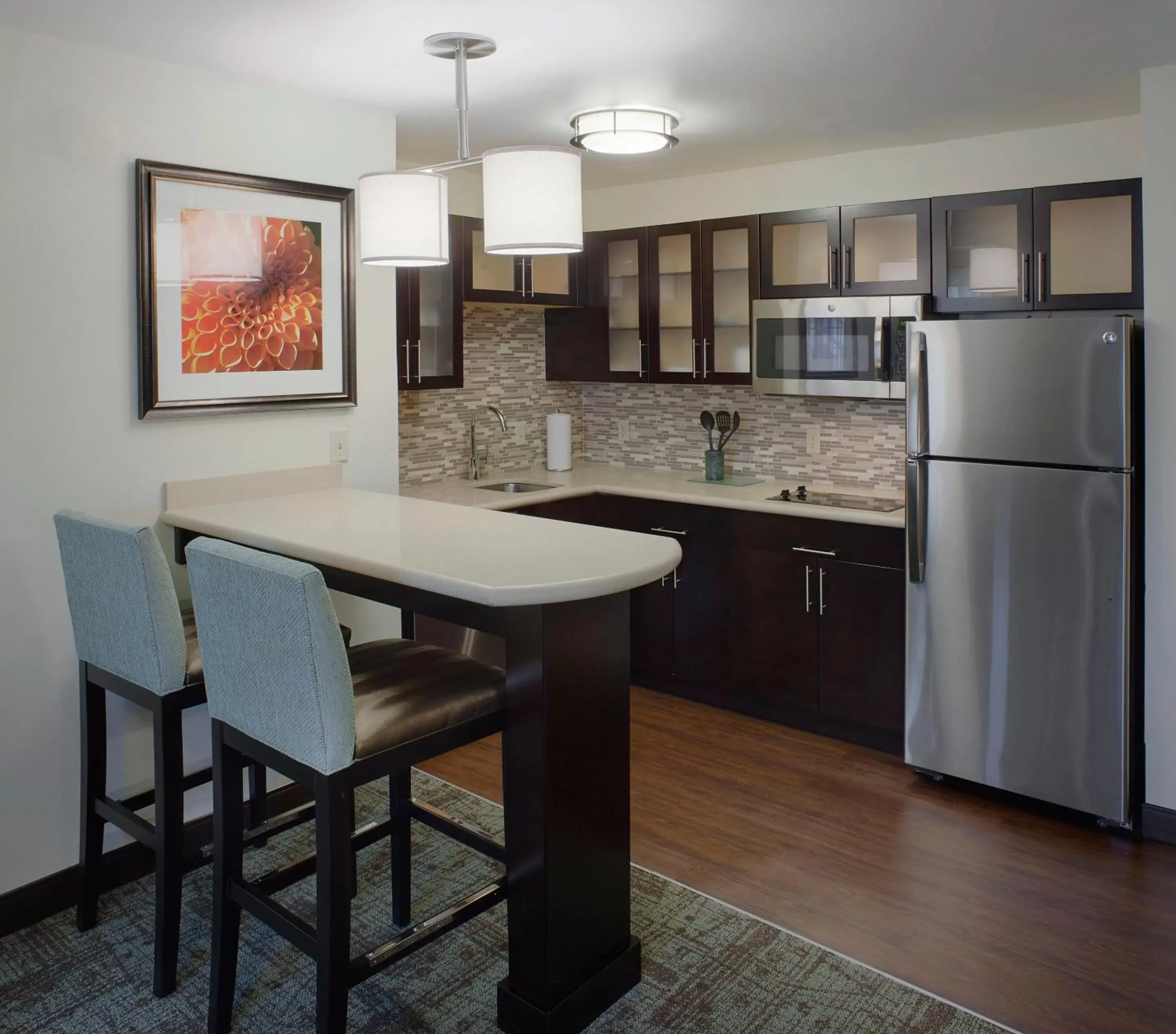 Photo of the whole room, Kitchen/Kitchenette in Staybridge Suites Fayetteville, an IHG Hotel