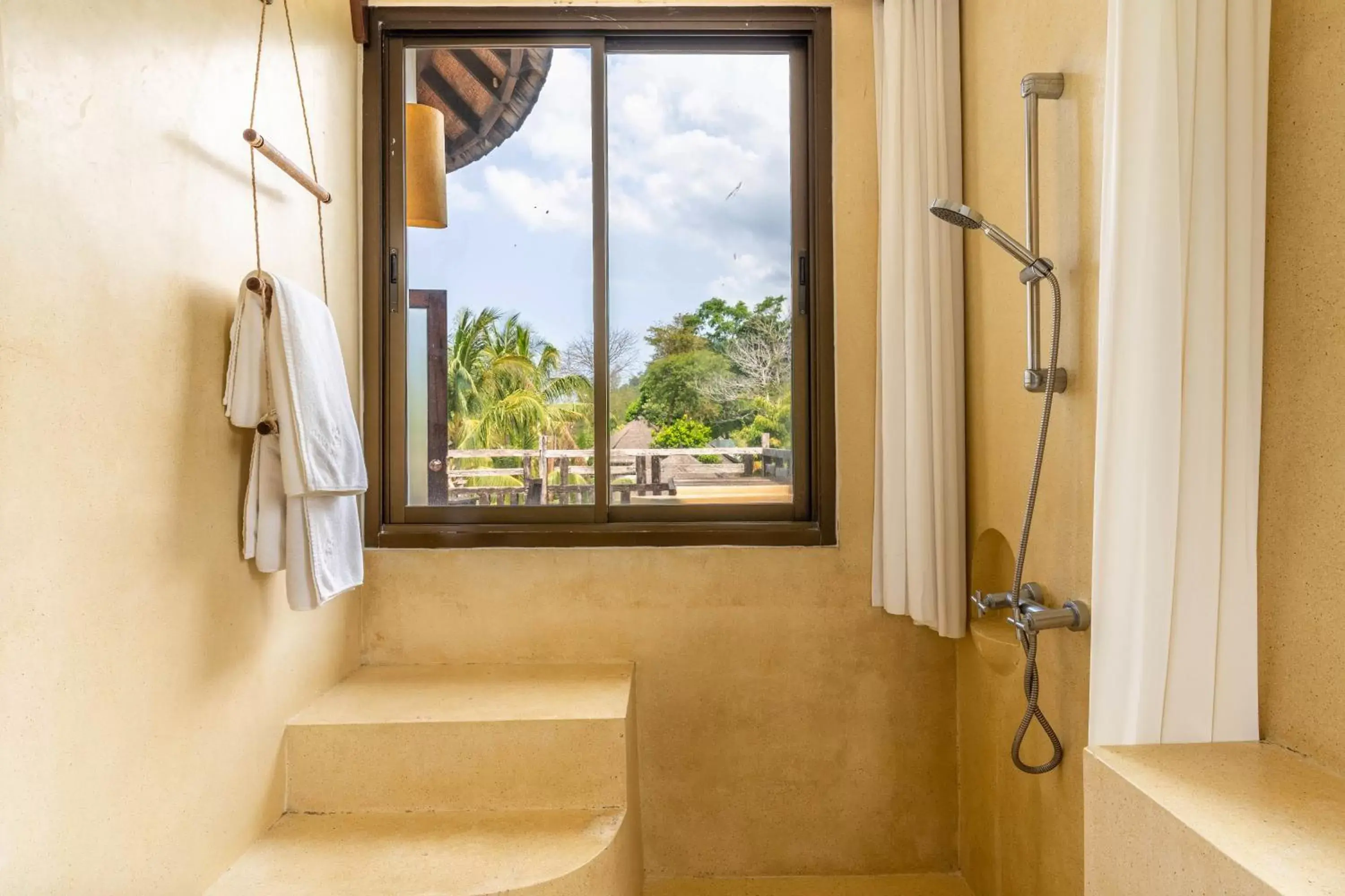 Bathroom in Aana Resort & Spa