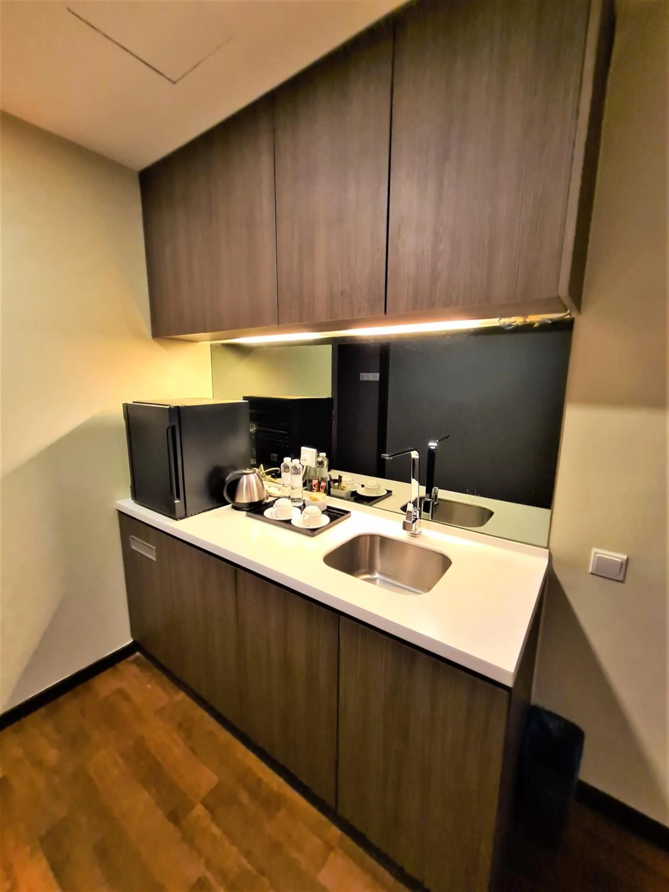 Kitchen or kitchenette in Nexus Regency Suites & Hotel