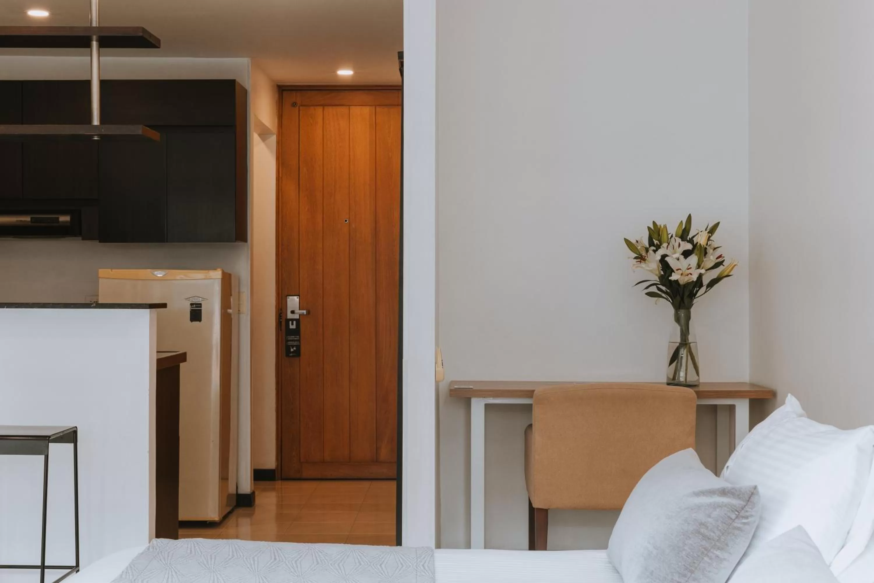 Photo of the whole room in Travelers Orange Suites