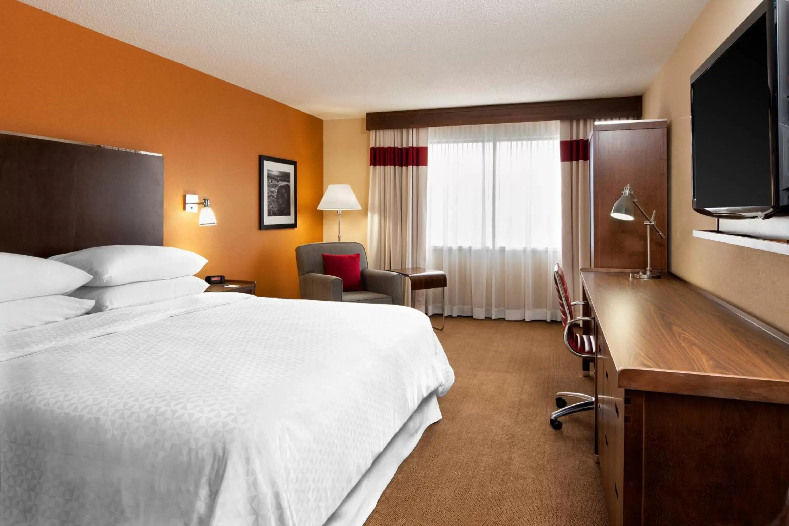 Photo of the whole room, TV/Entertainment Center in Four Points by Sheraton Edmundston Hotel & Conference Center