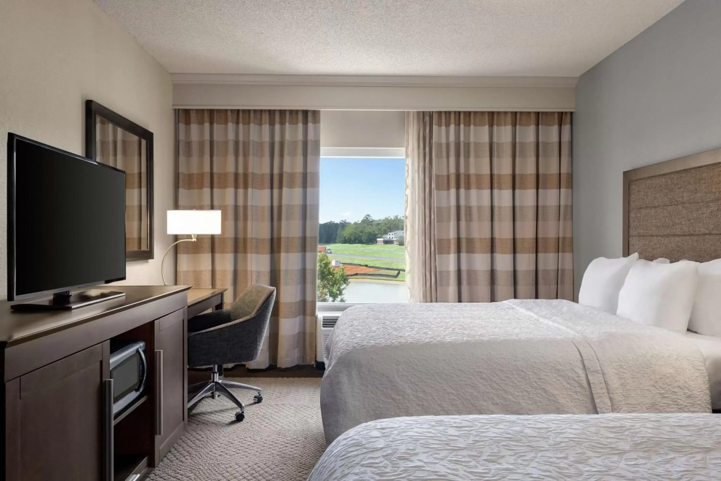 Bedroom, TV/Entertainment Center in Hampton Inn & Suites Montgomery-EastChase