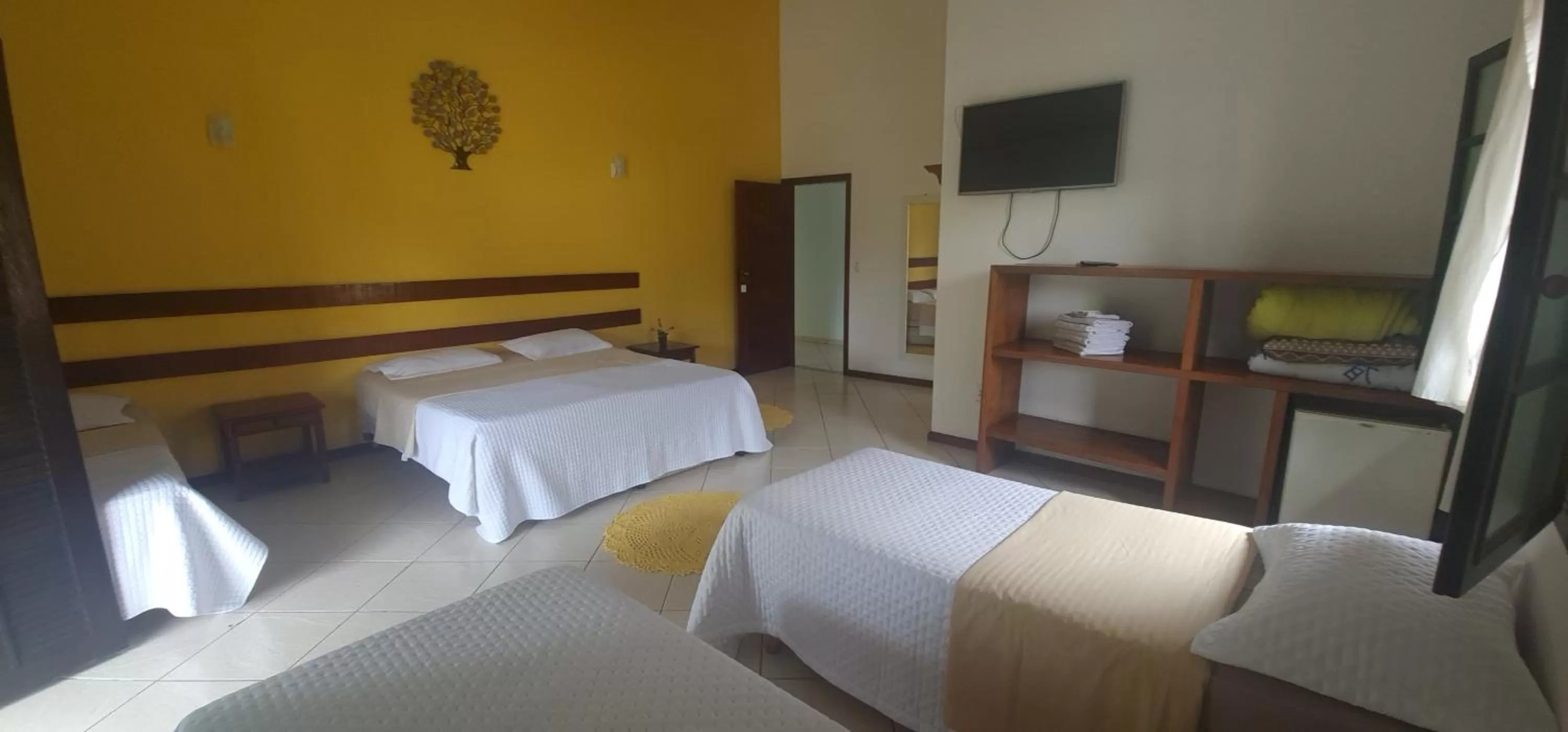 Photo of the whole room, Bed in Pousada Flor de Paraty