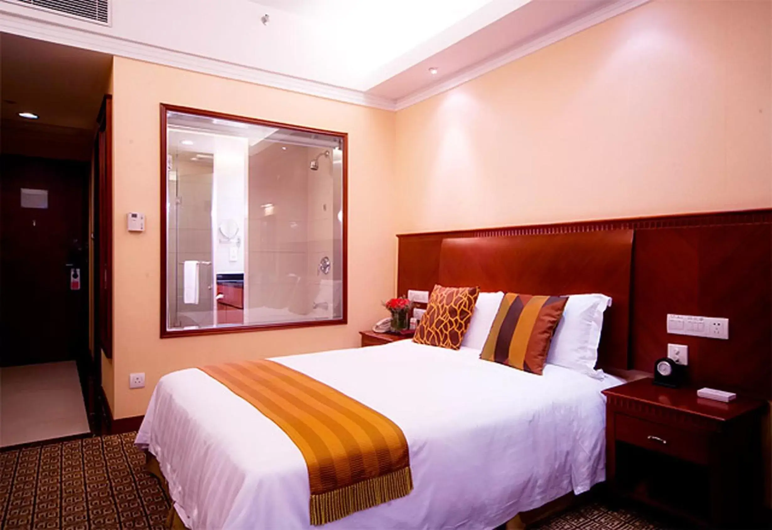 Photo of the whole room, Bed in Ramada by Wyndham Pearl Guangzhou-Canton Fair Free Shuttle Bus