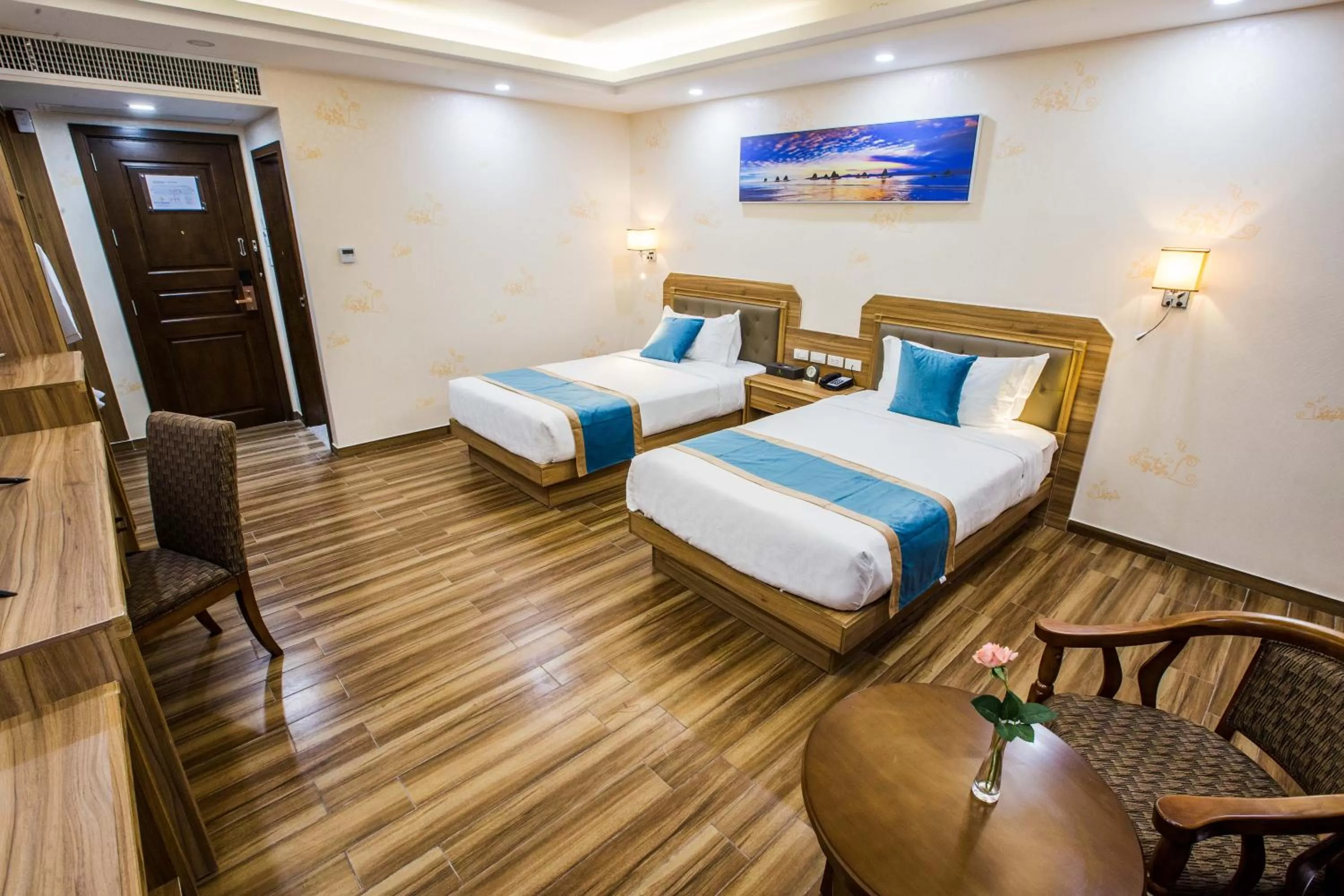 Bed in Costa Palawan Resort