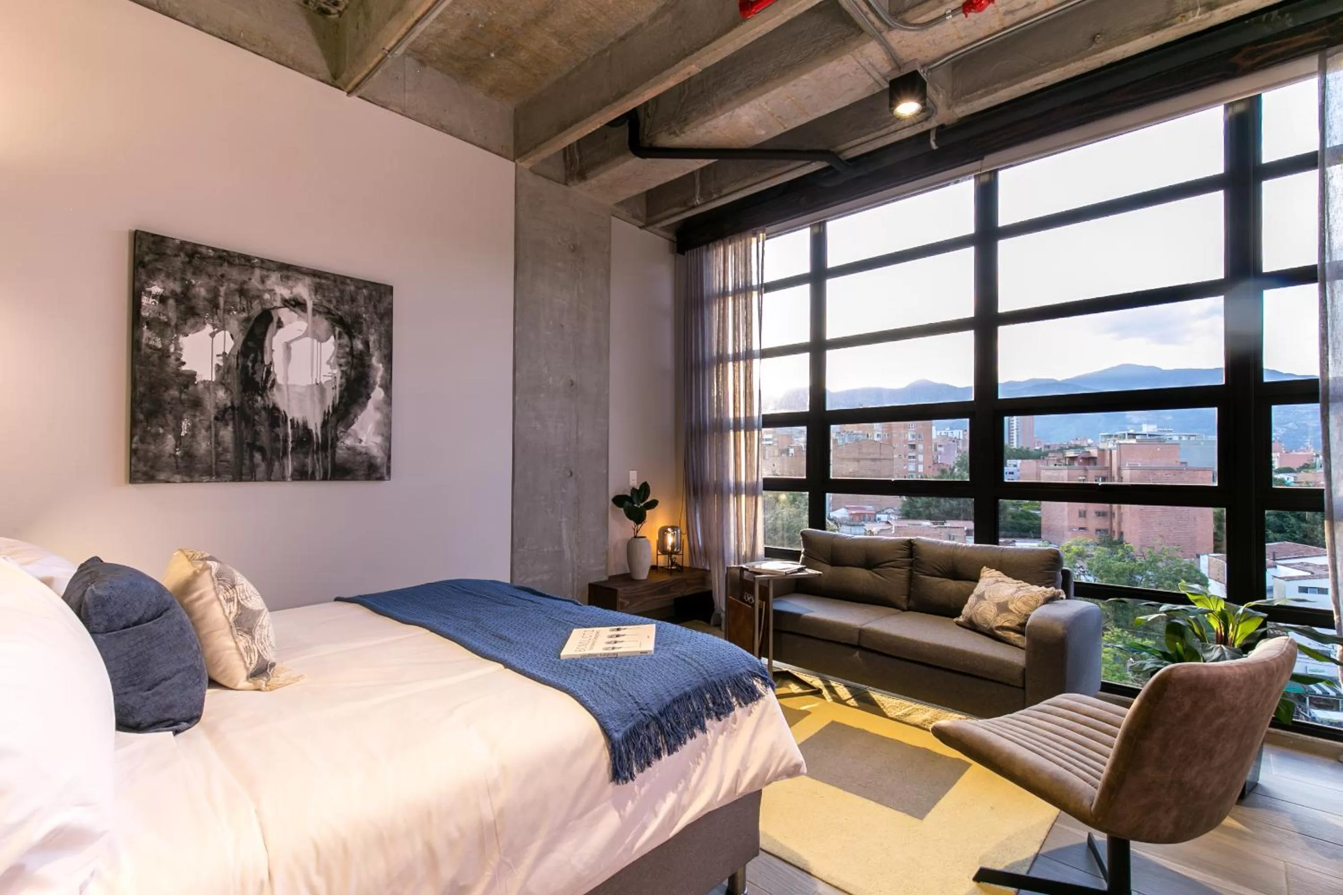 Bed in Factory Lofts Hotel