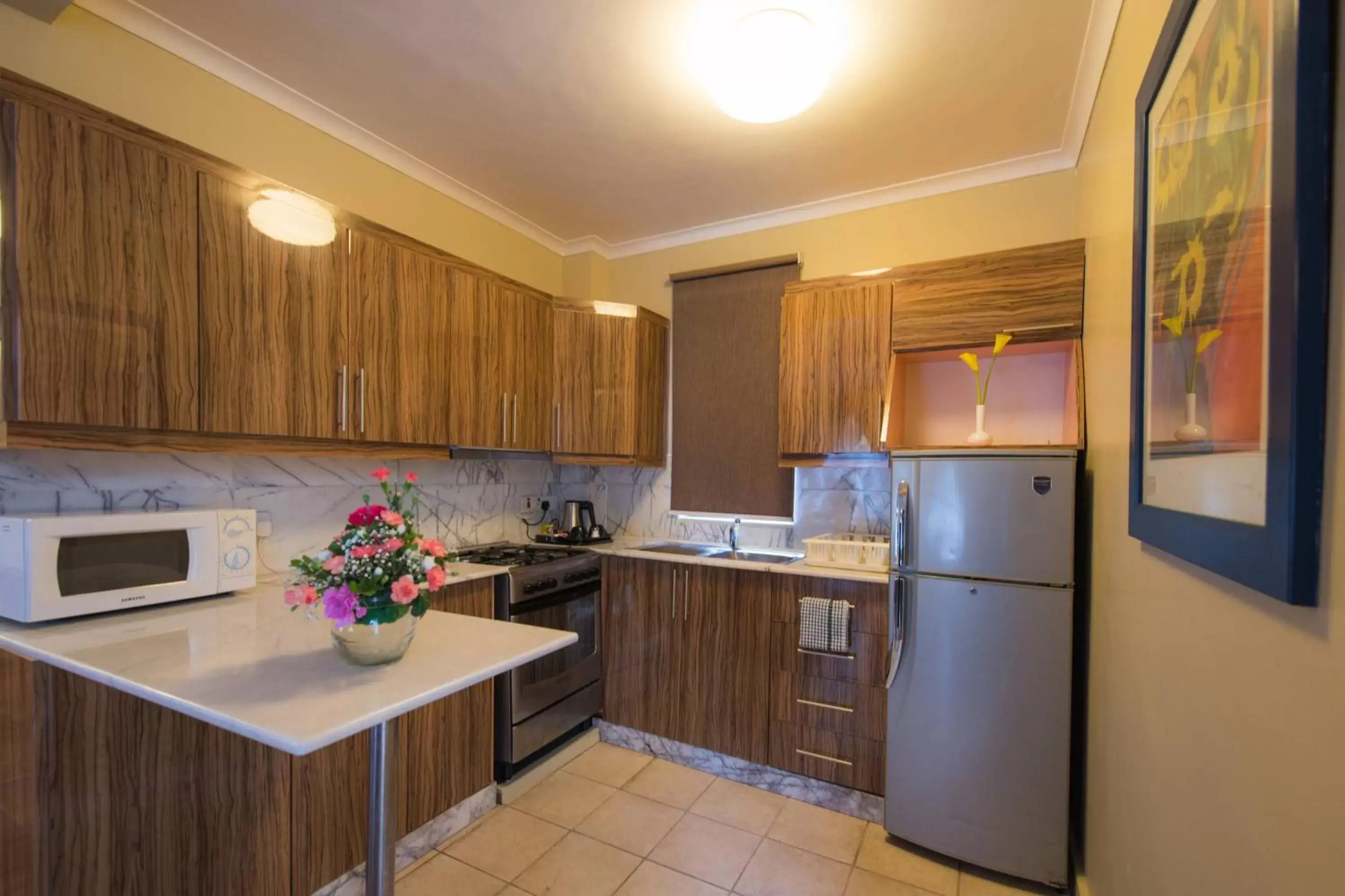 Kitchen or kitchenette, Kitchen/Kitchenette in Protea Hotel by Marriott Dar es Salaam Oyster Bay