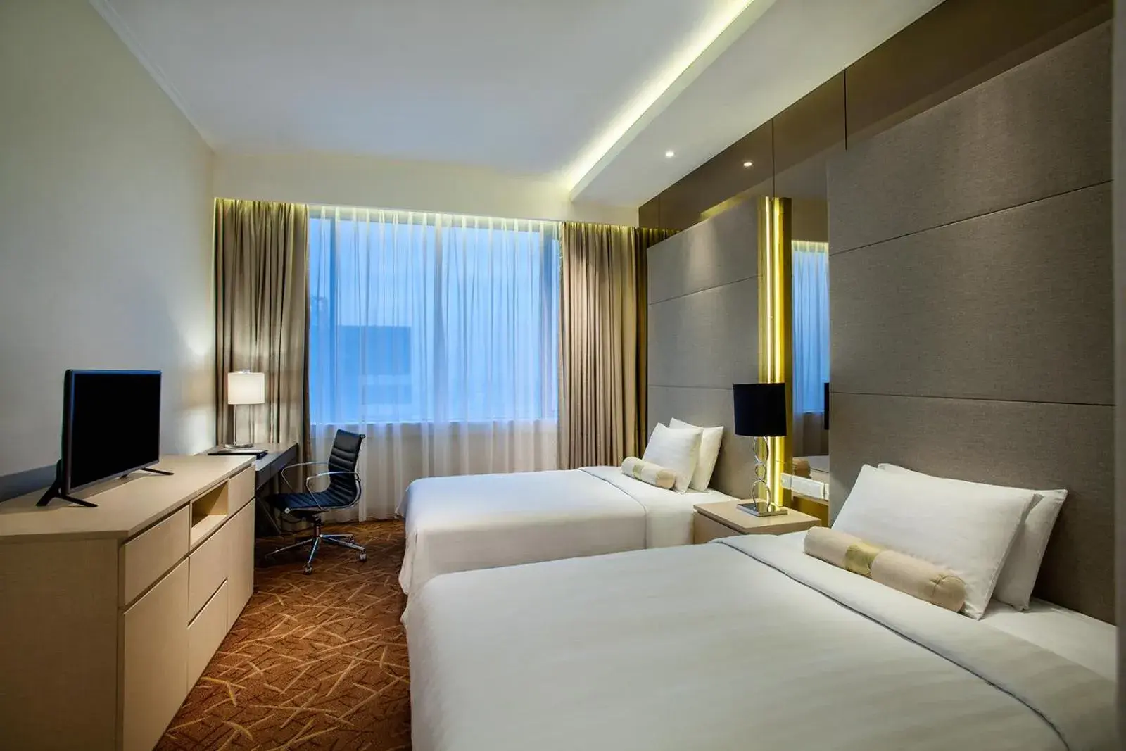 Bedroom in Menara Peninsula Hotel