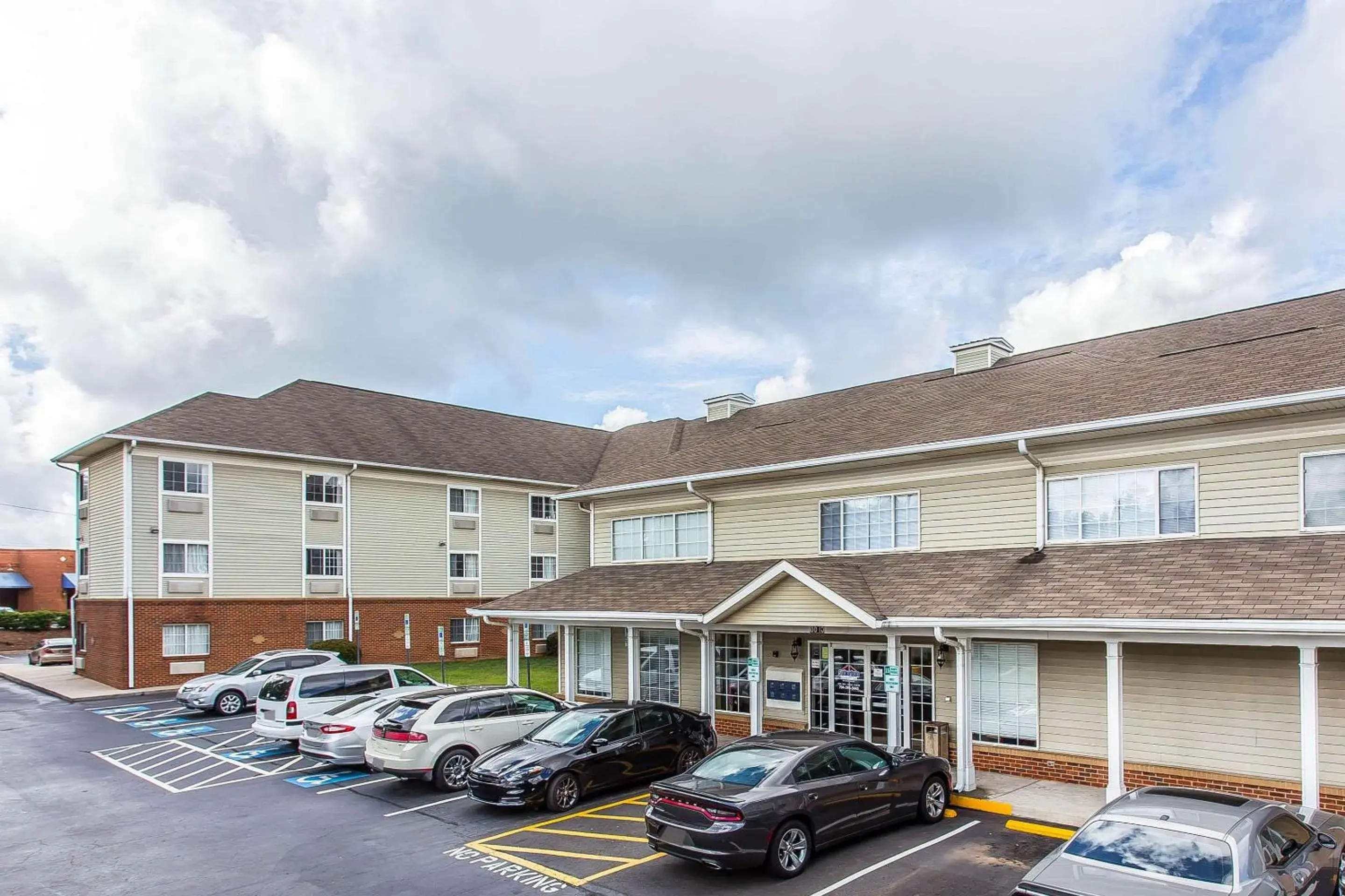 Property Building in Suburban Studios near University of North Carolina-Charlotte