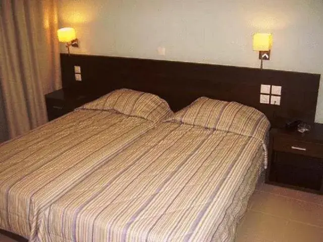 Bed in Hotel Electra