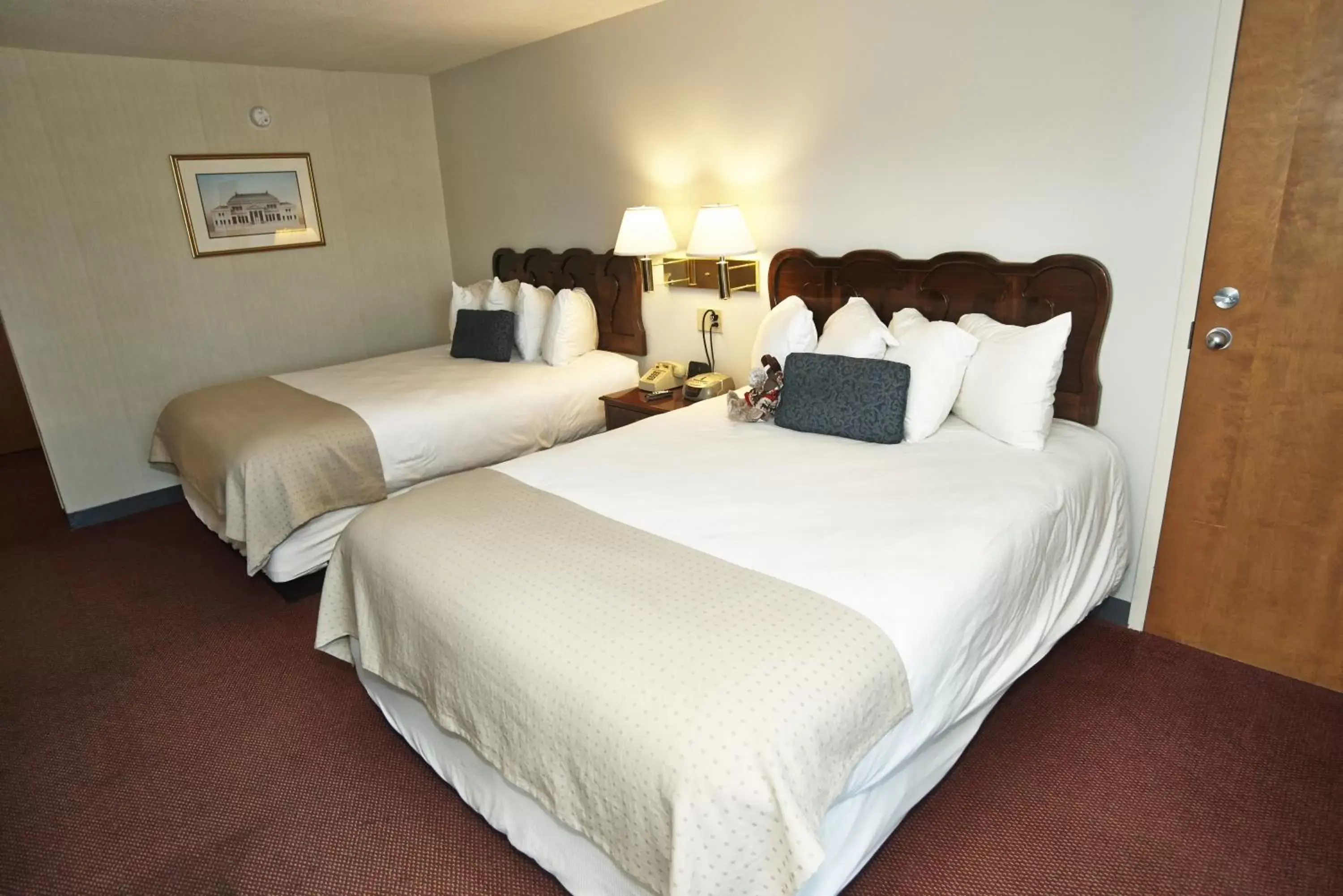Bed in Fireside Inn & Suites Gilford