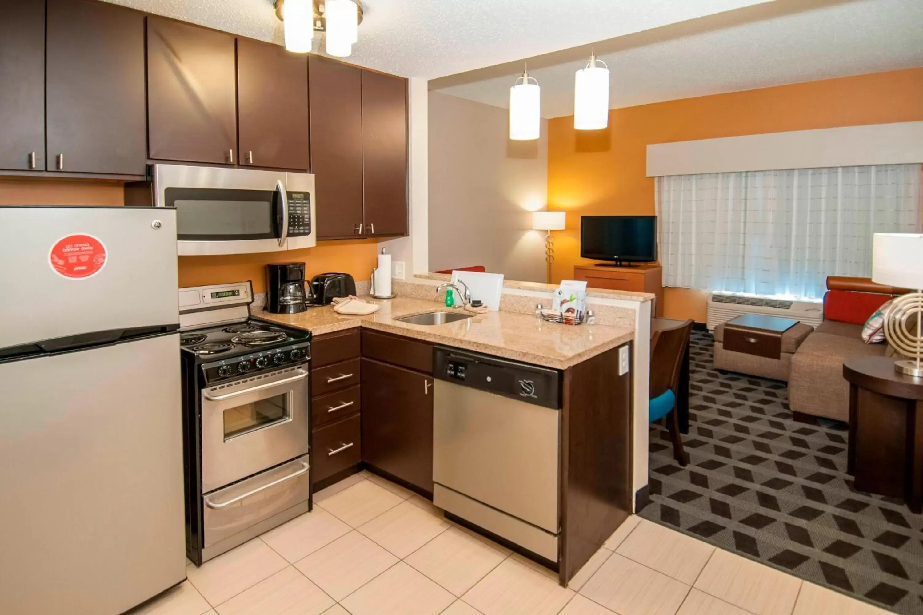 Bedroom, Kitchen/Kitchenette in TownePlace Suites by Marriott Baton Rouge Gonzales
