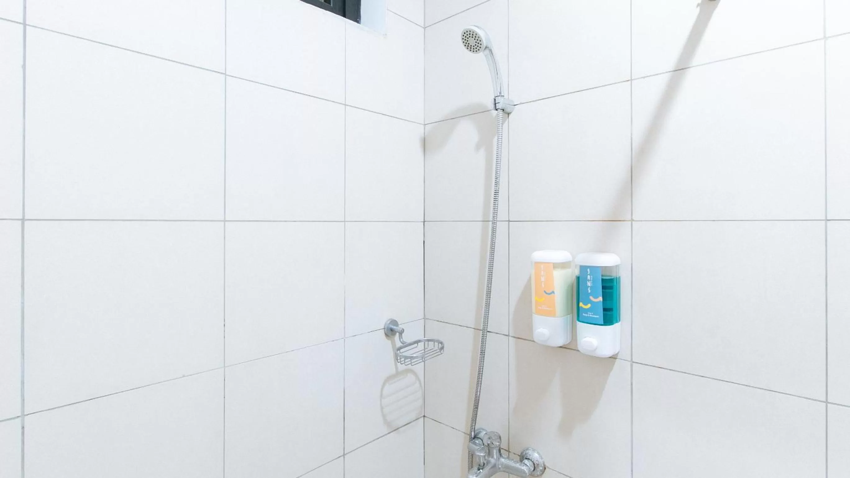 Shower in Sans Hotel Laperal Manila