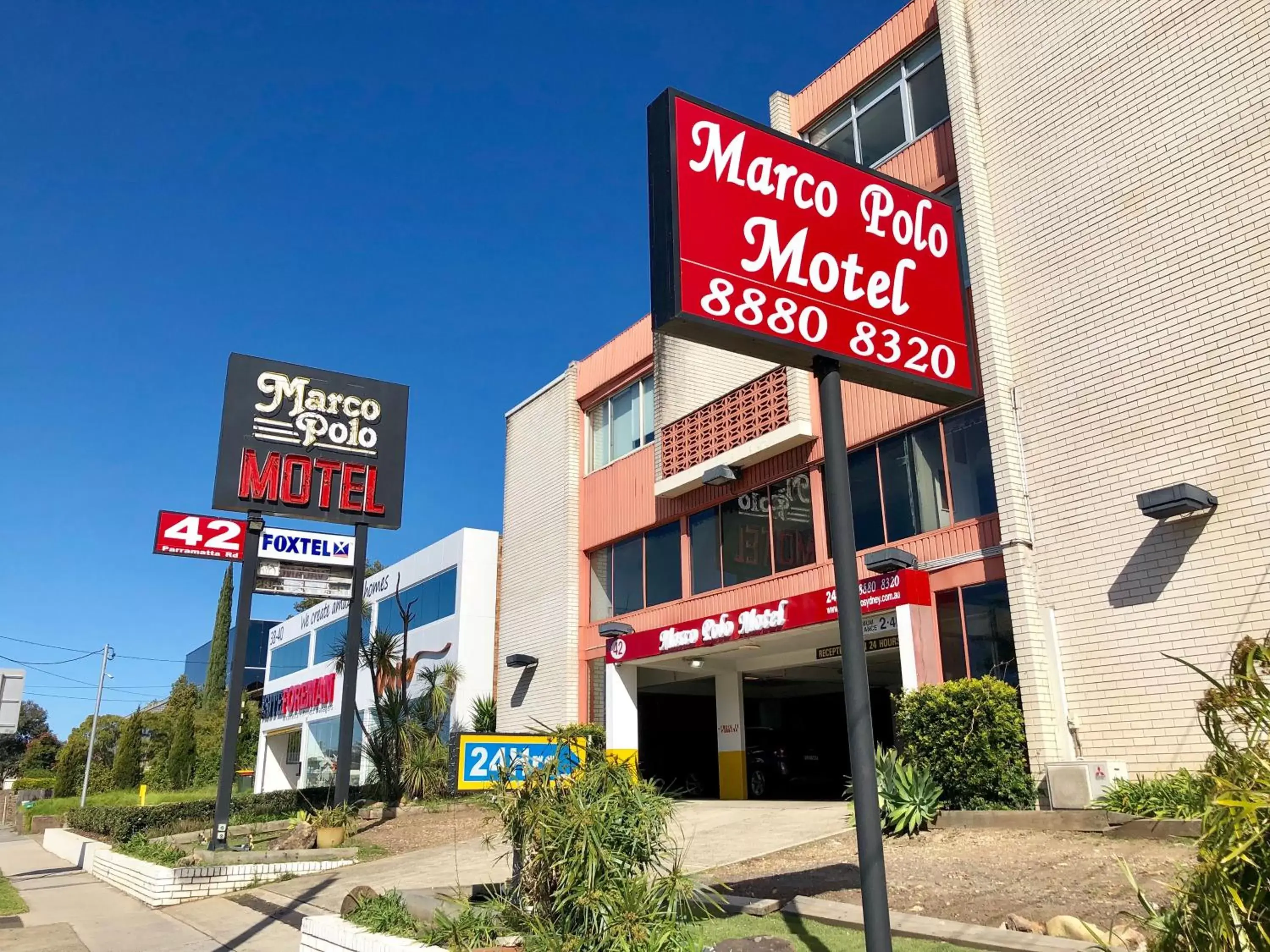 Property building, Property Logo/Sign in Marco Polo Motor Inn Sydney