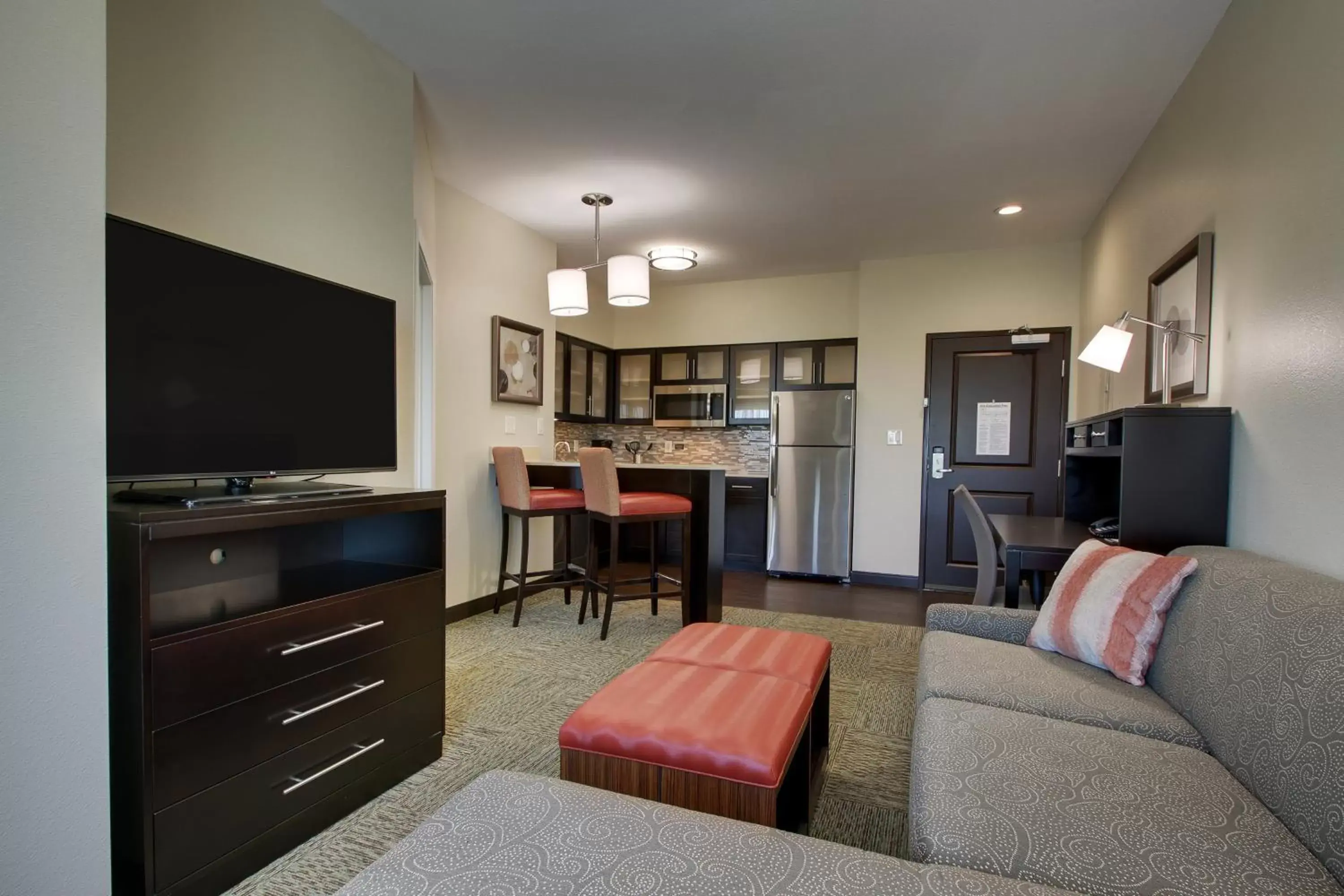 Photo of the whole room, TV/Entertainment Center in Staybridge Suites Plano - The Colony, an IHG Hotel