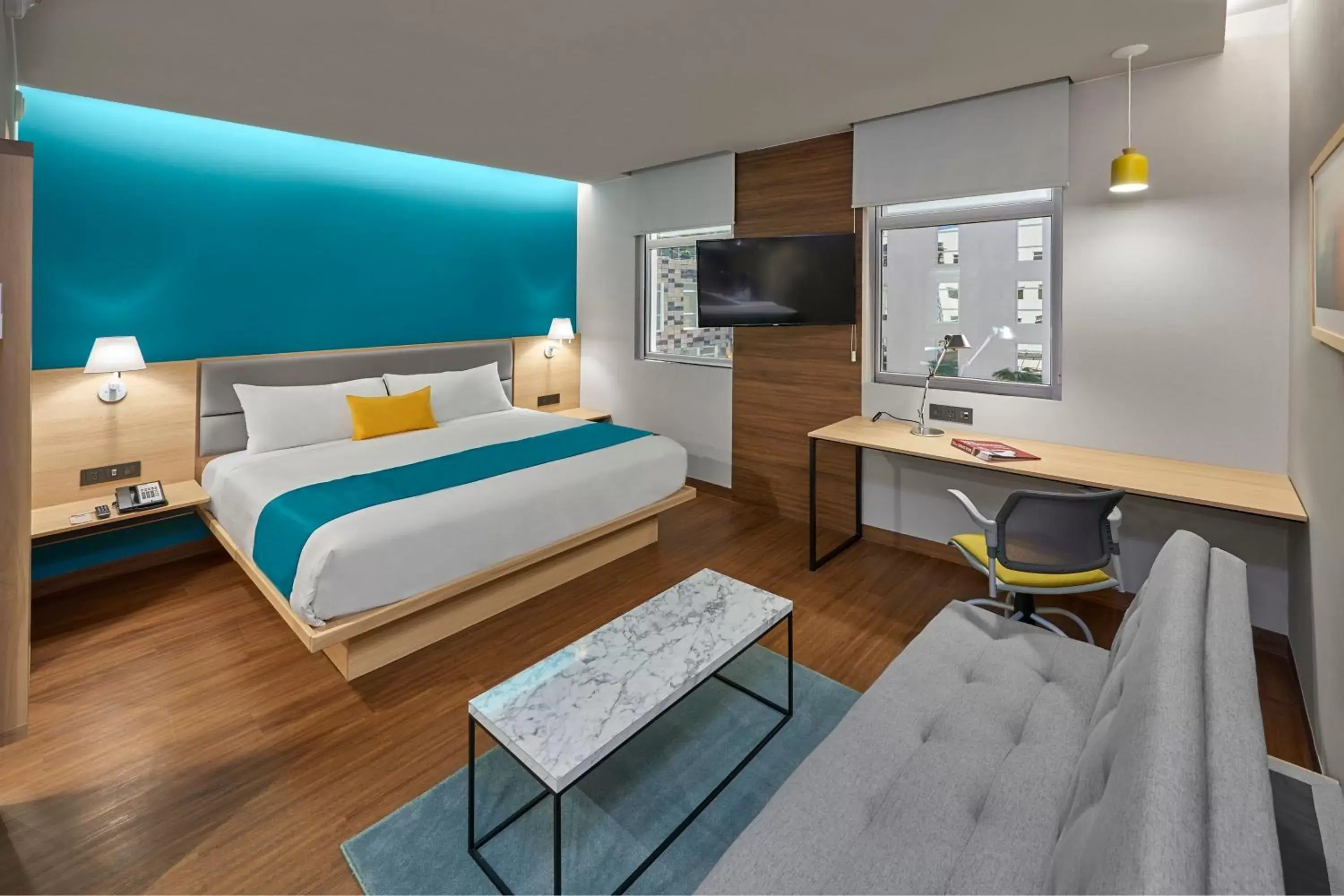 Bedroom in City Express Suites by Marriott Cancún Aeropuerto