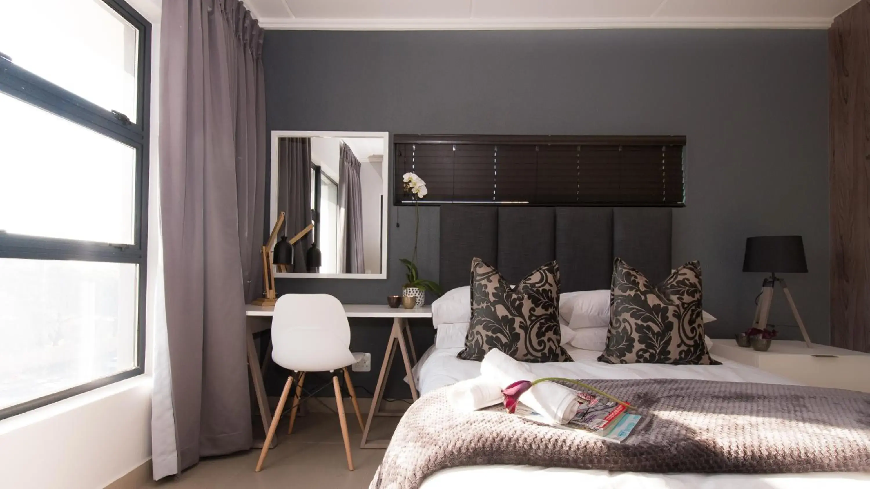 Bedroom in Odyssey Luxury Apartments