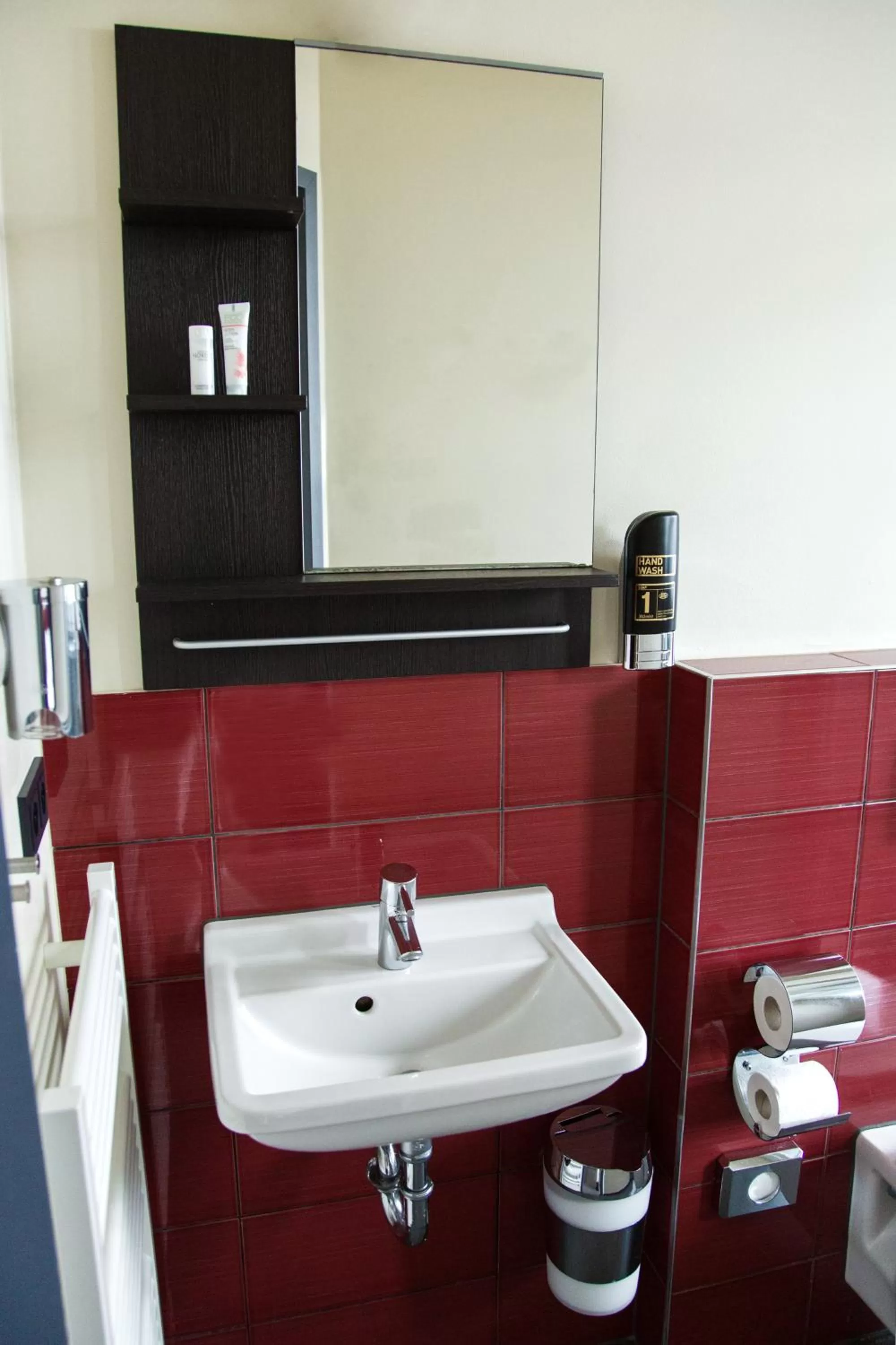 Bathroom in Base Apartments