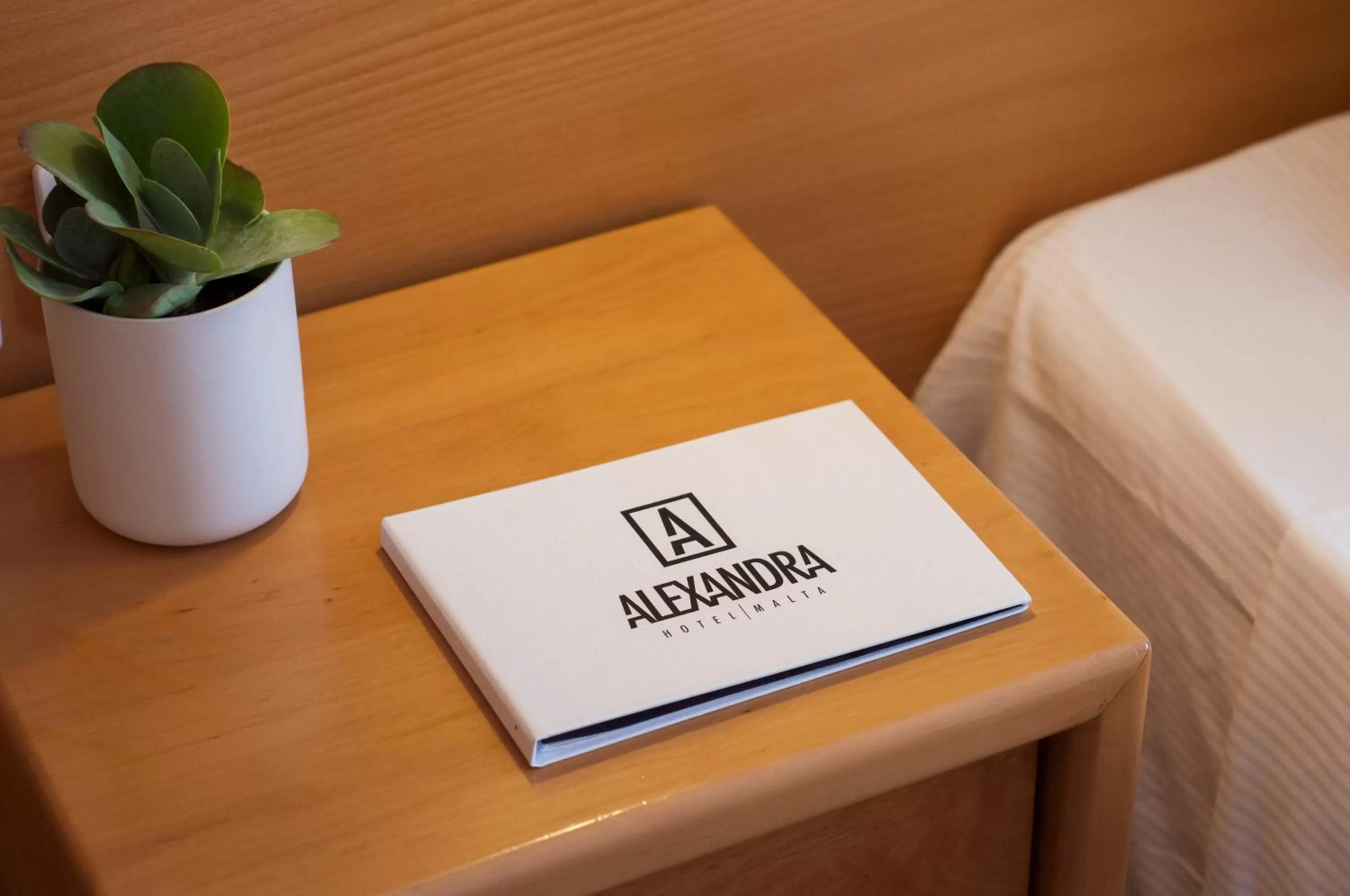 Decorative detail, Bed in Alexandra Hotel