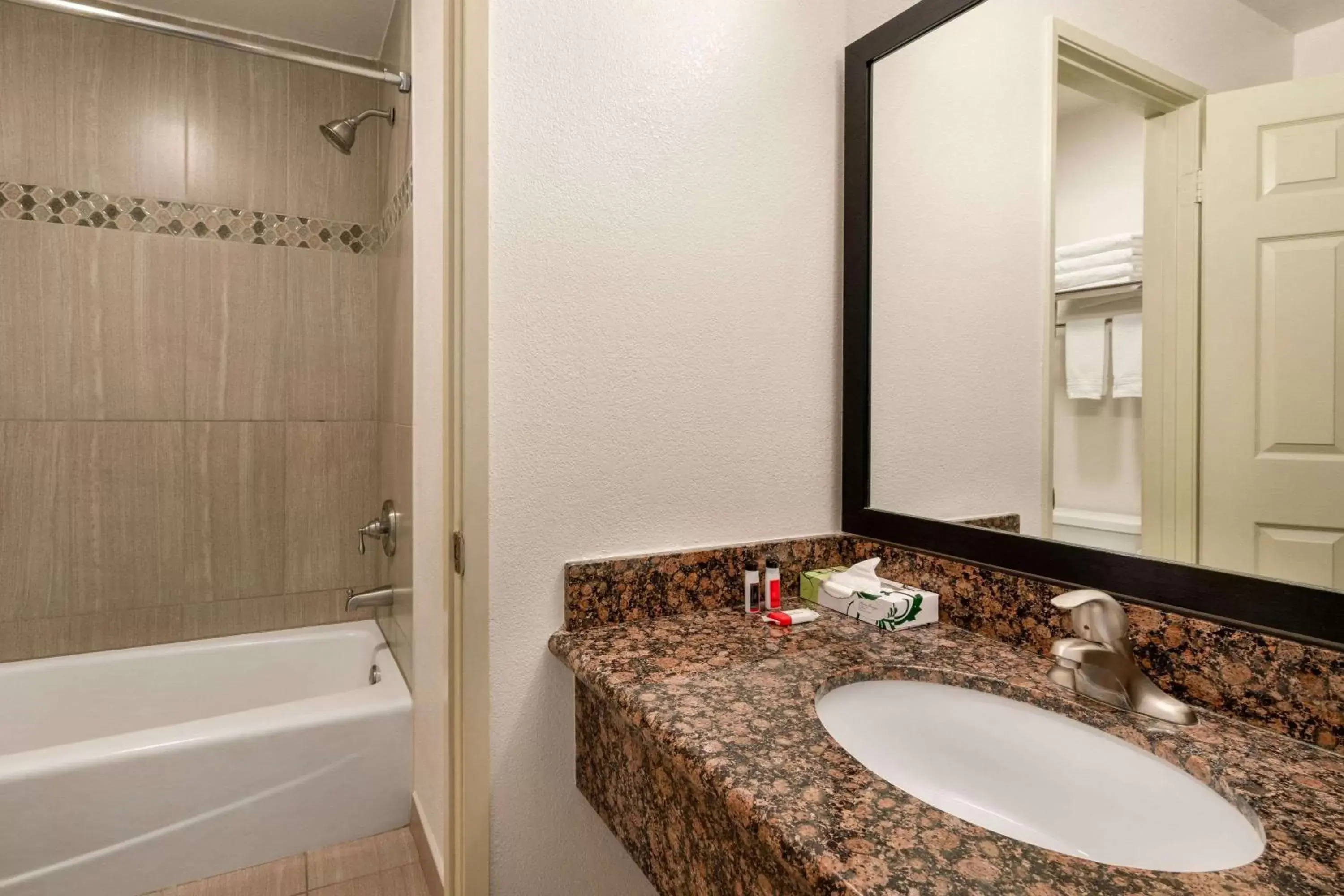 Bathroom in Super 8 by Wyndham Santa Clarita/Valencia