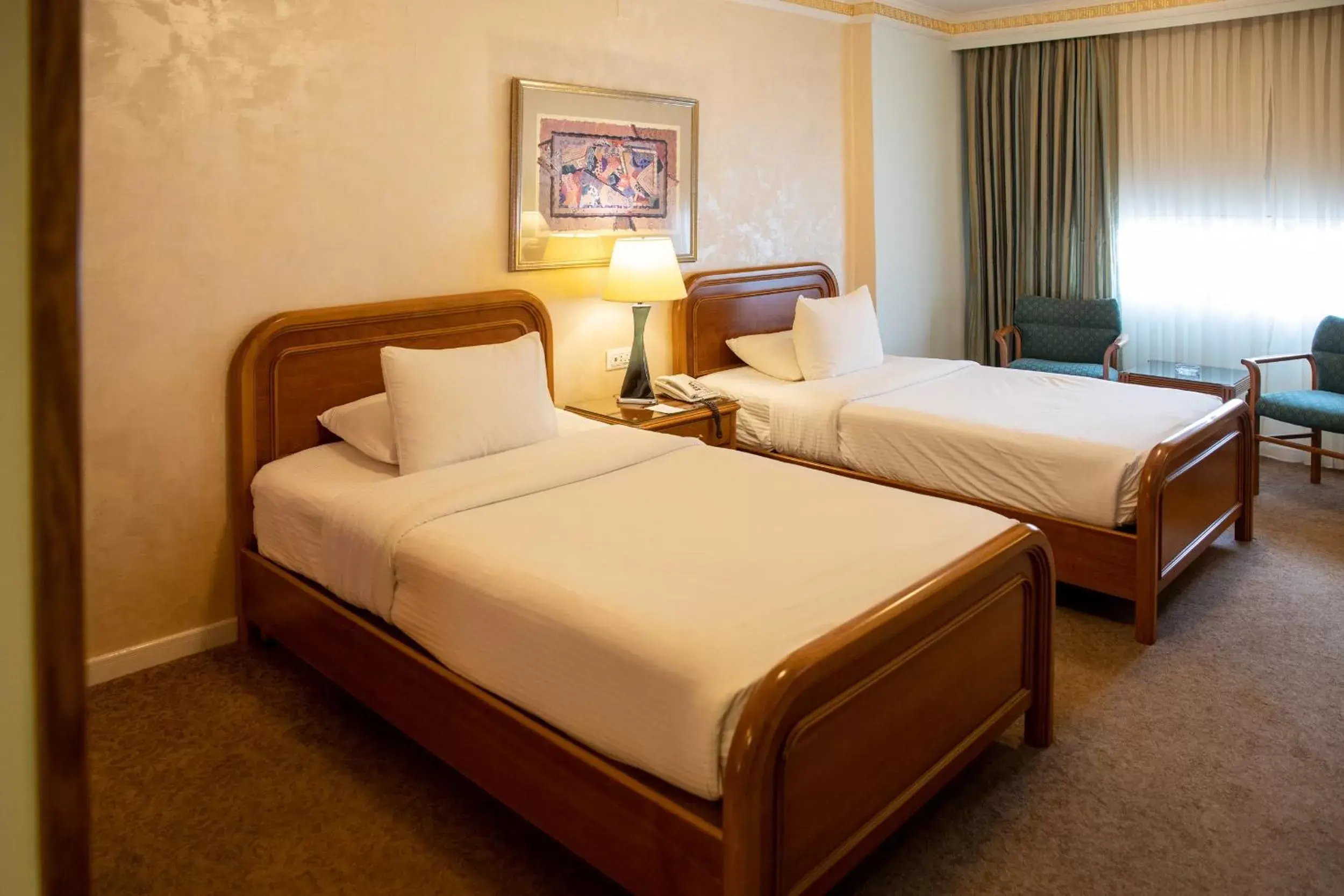 Photo of the whole room, Bed in Amman International Hotel