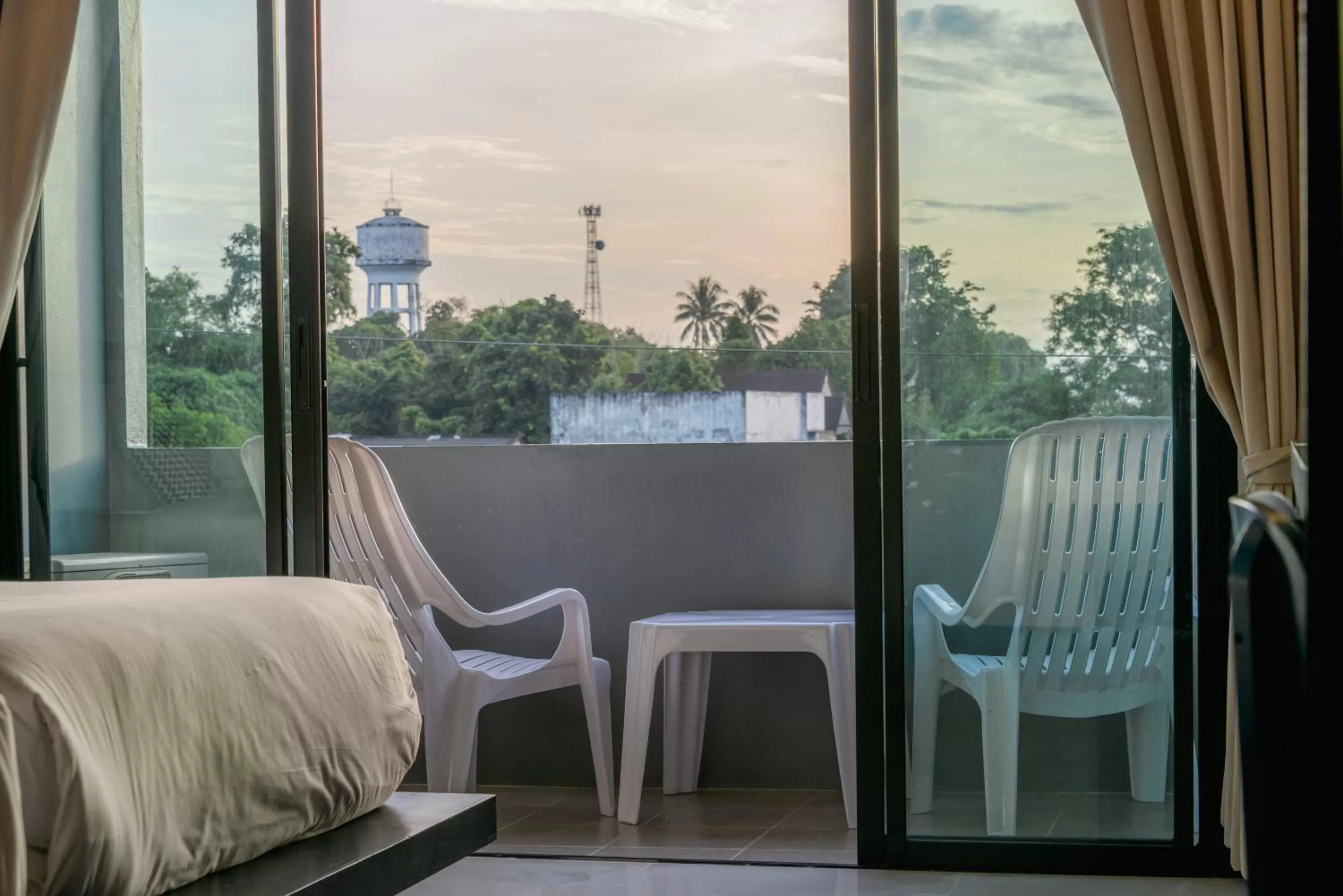 Balcony/Terrace, Bed in Sleep Whale Hotel