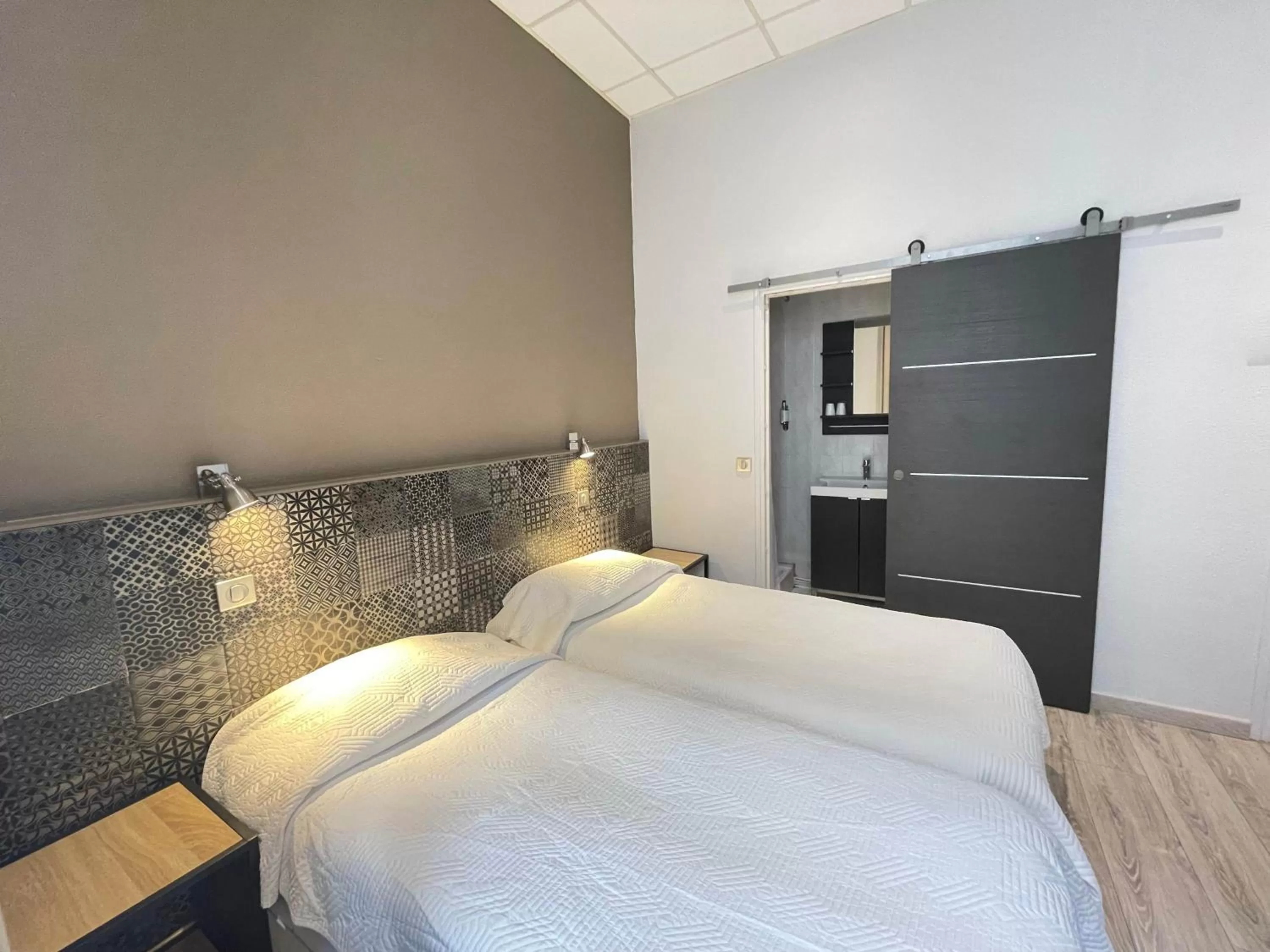 Bed in Hotel de La Comédie