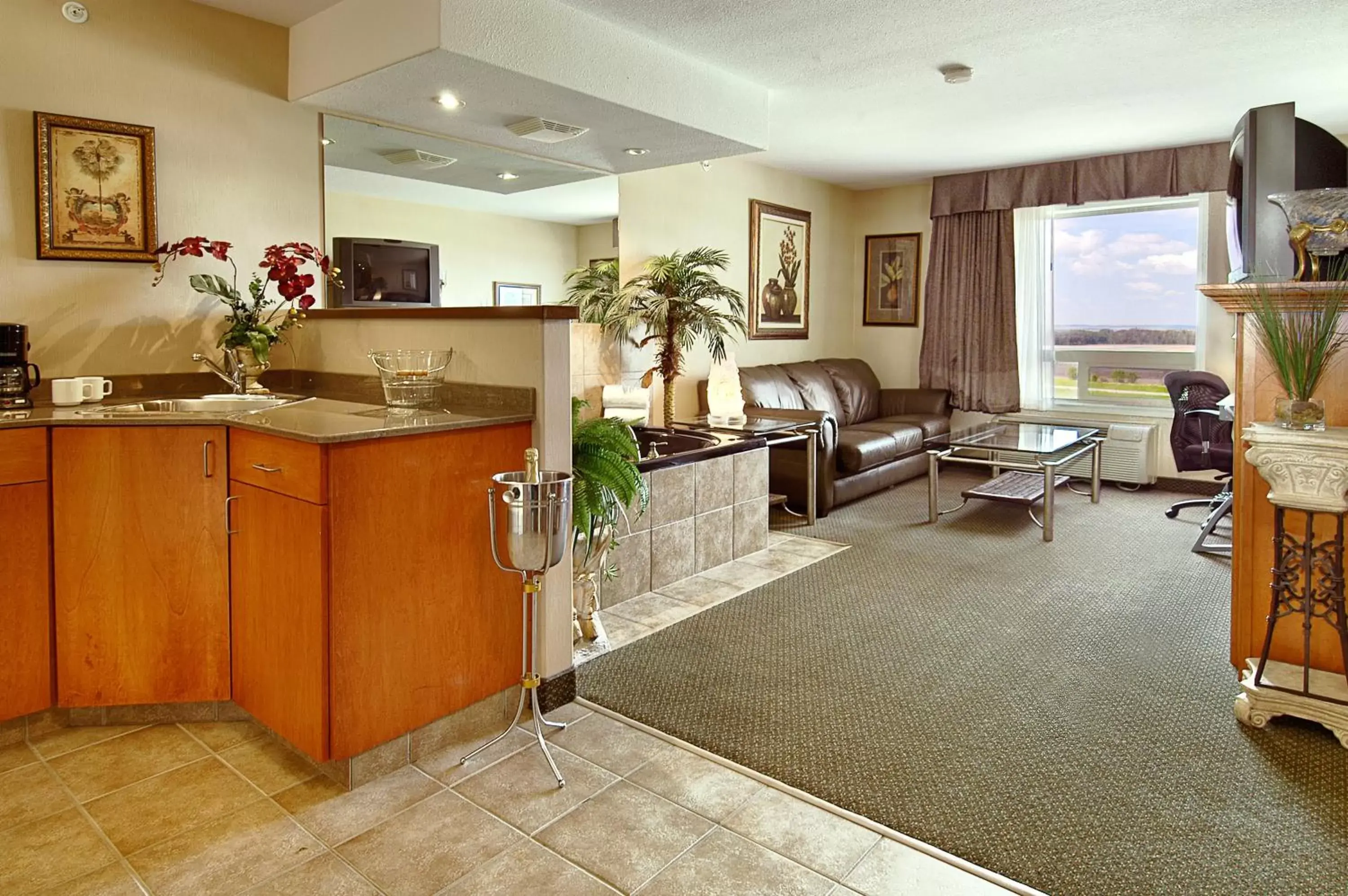 Living room in Ramada by Wyndham Clairmont/Grande Prairie