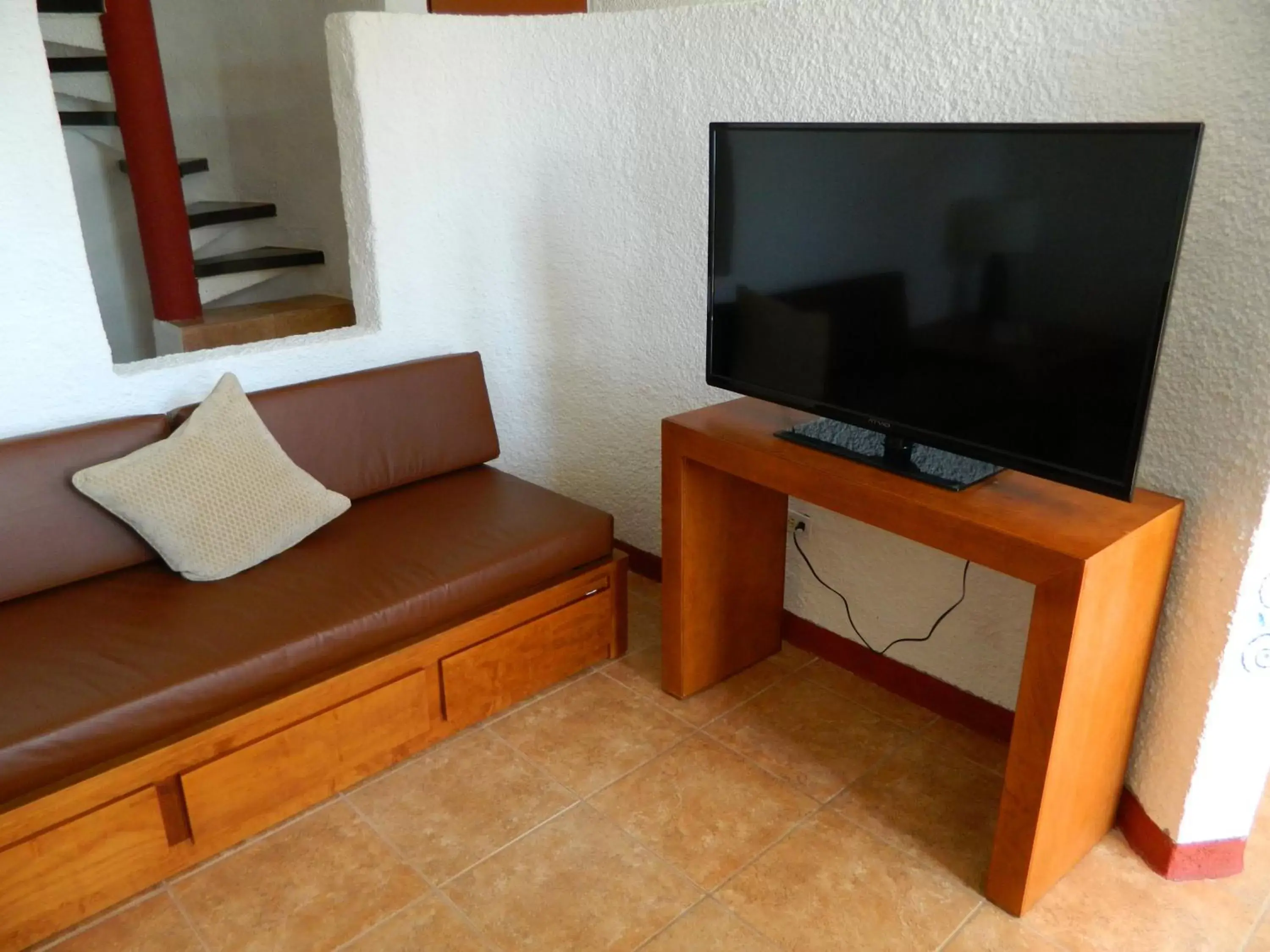 Living room, TV/Entertainment Center in Puerto Nuevo Baja Hotel & Villas