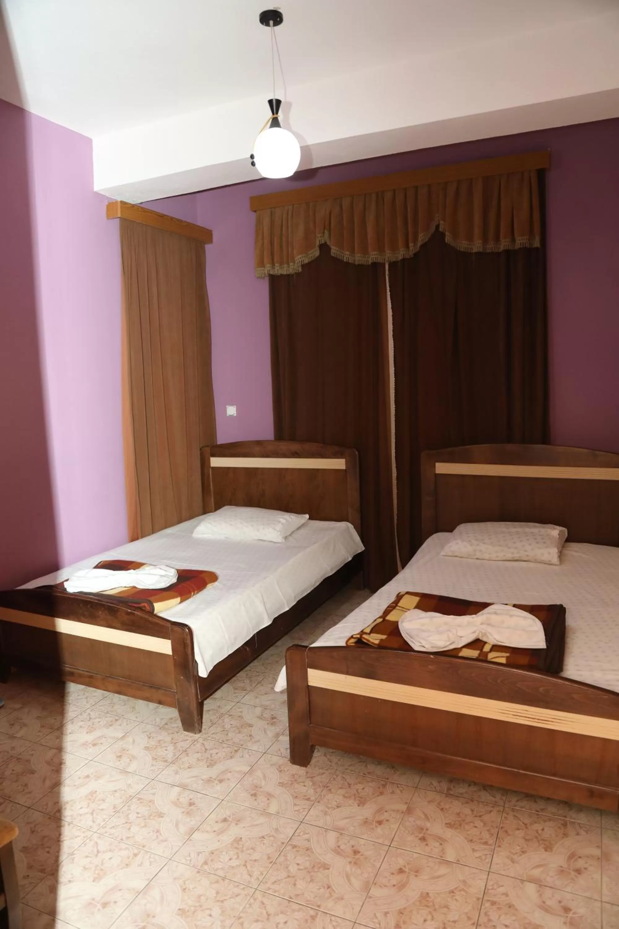 Bed in Hotel Kabashi