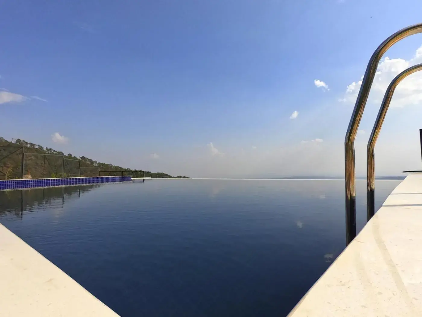 Swimming pool in Rakkh Resort, a member of Radisson Individuals Retreats