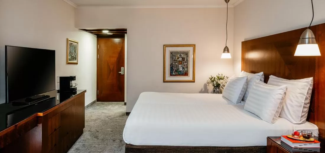 Bedroom, Bed in Crowne Plaza Tel Aviv Beach by IHG