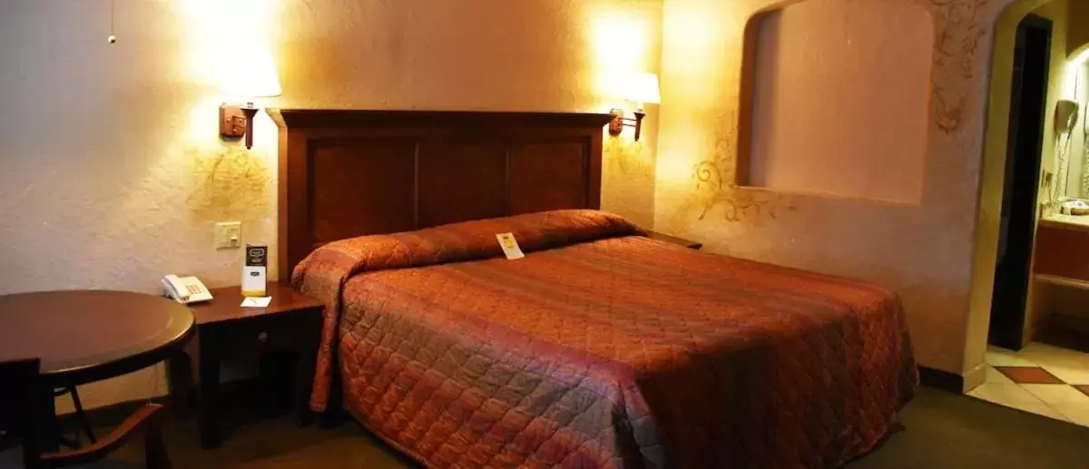Bed in Hotel Siesta Real