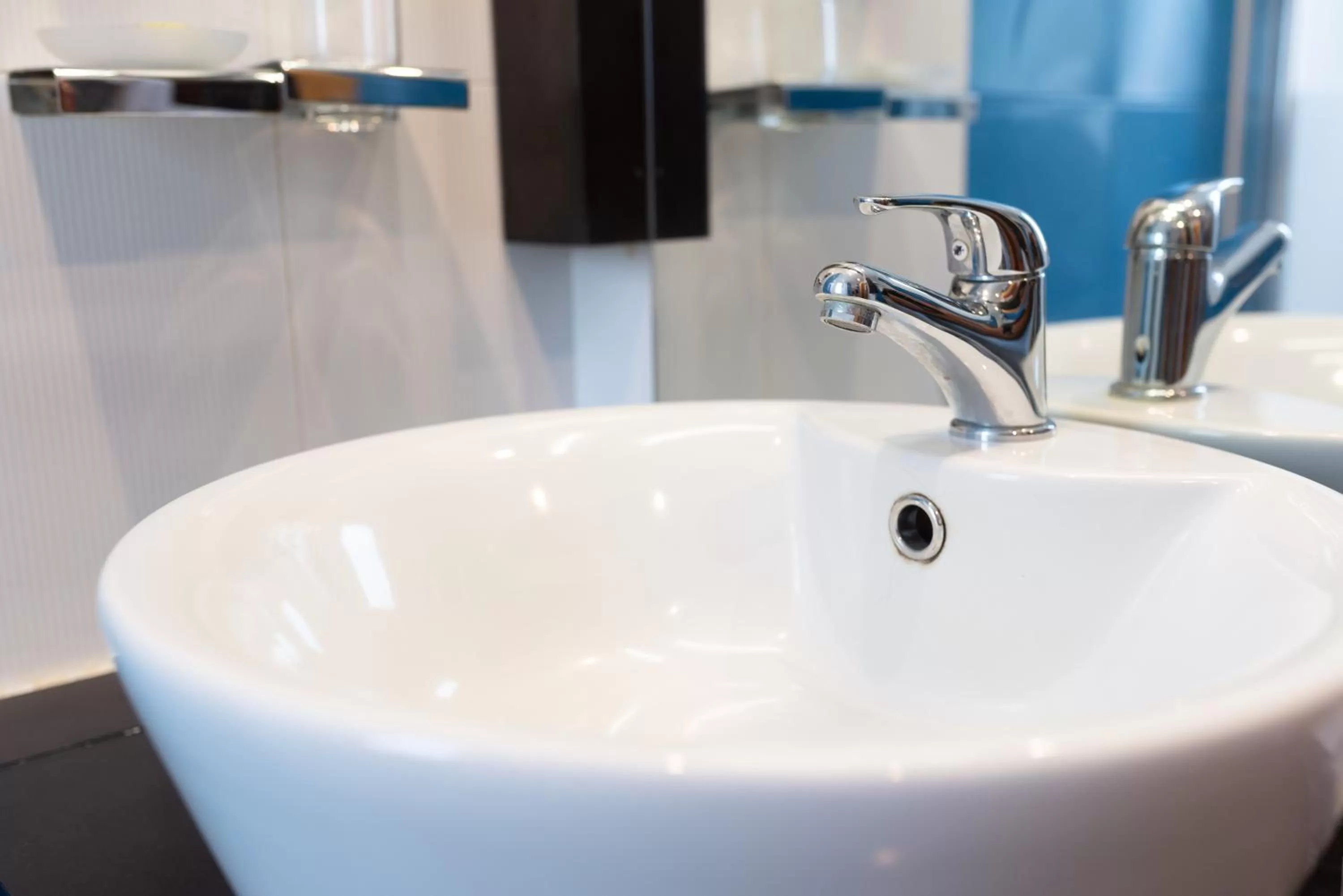Bathroom in Heliotrope Hotels