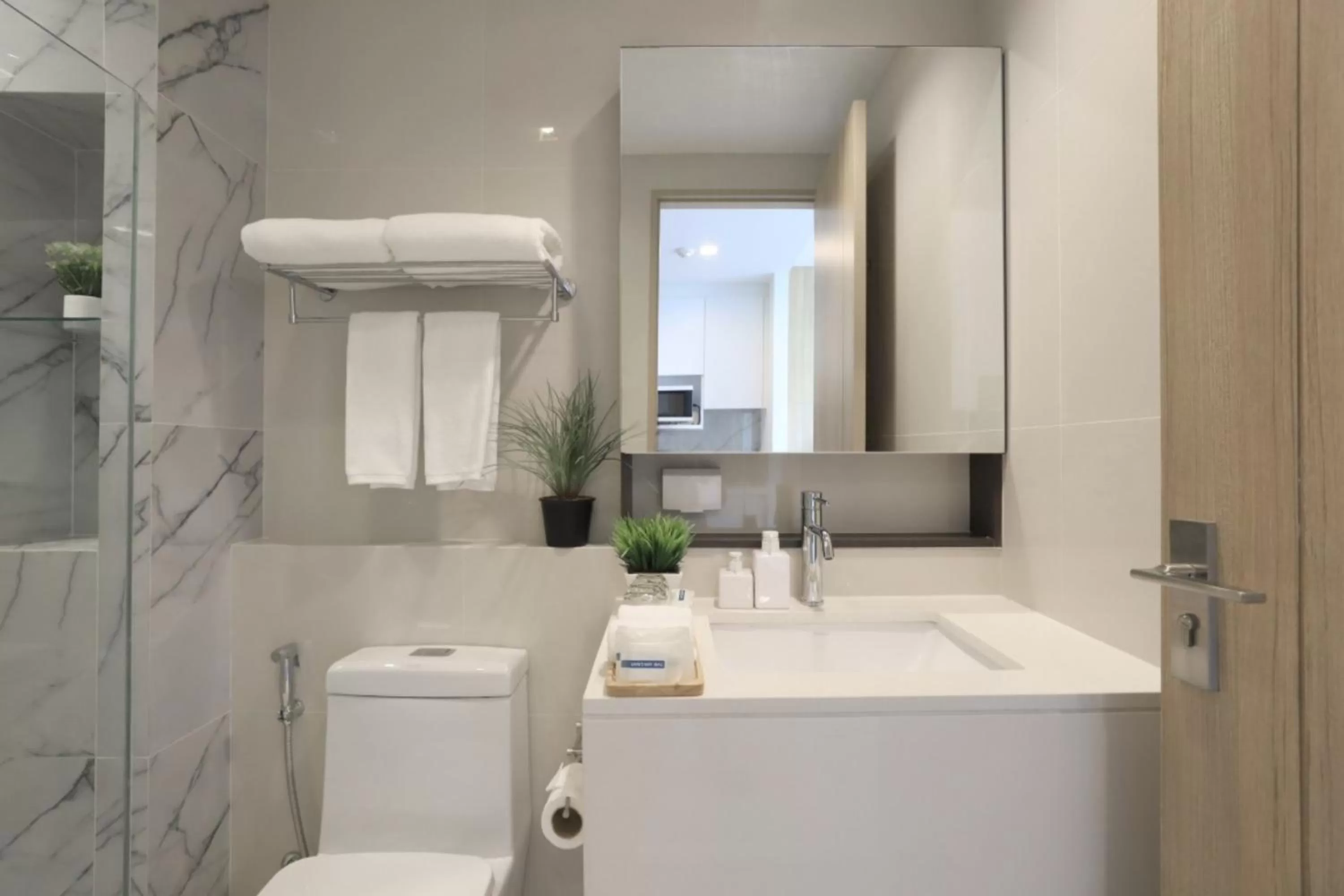 Toilet in Alix Bangkok Hotel