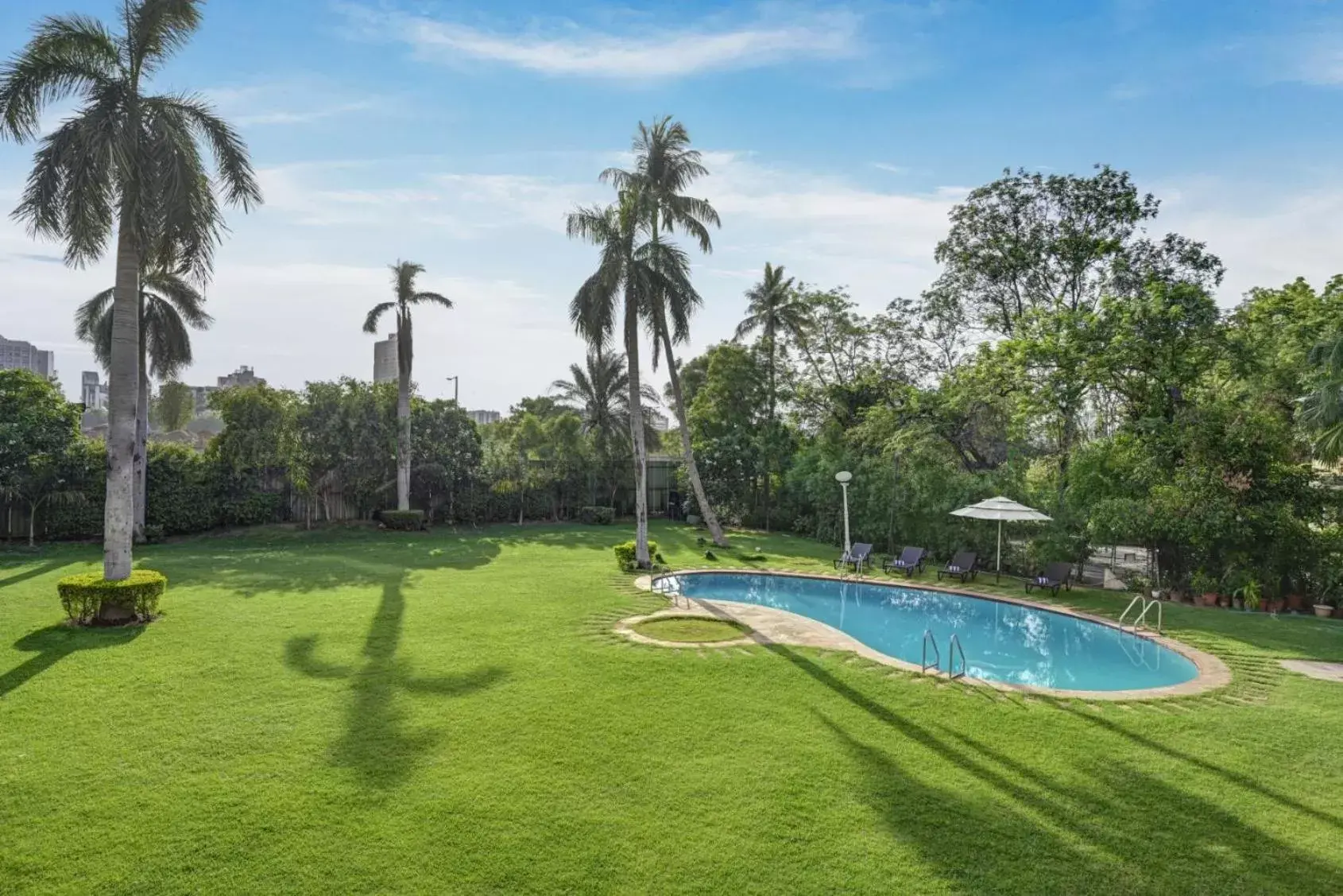 Garden, Swimming Pool in The Cama - A Sabarmati Riverfront Hotel