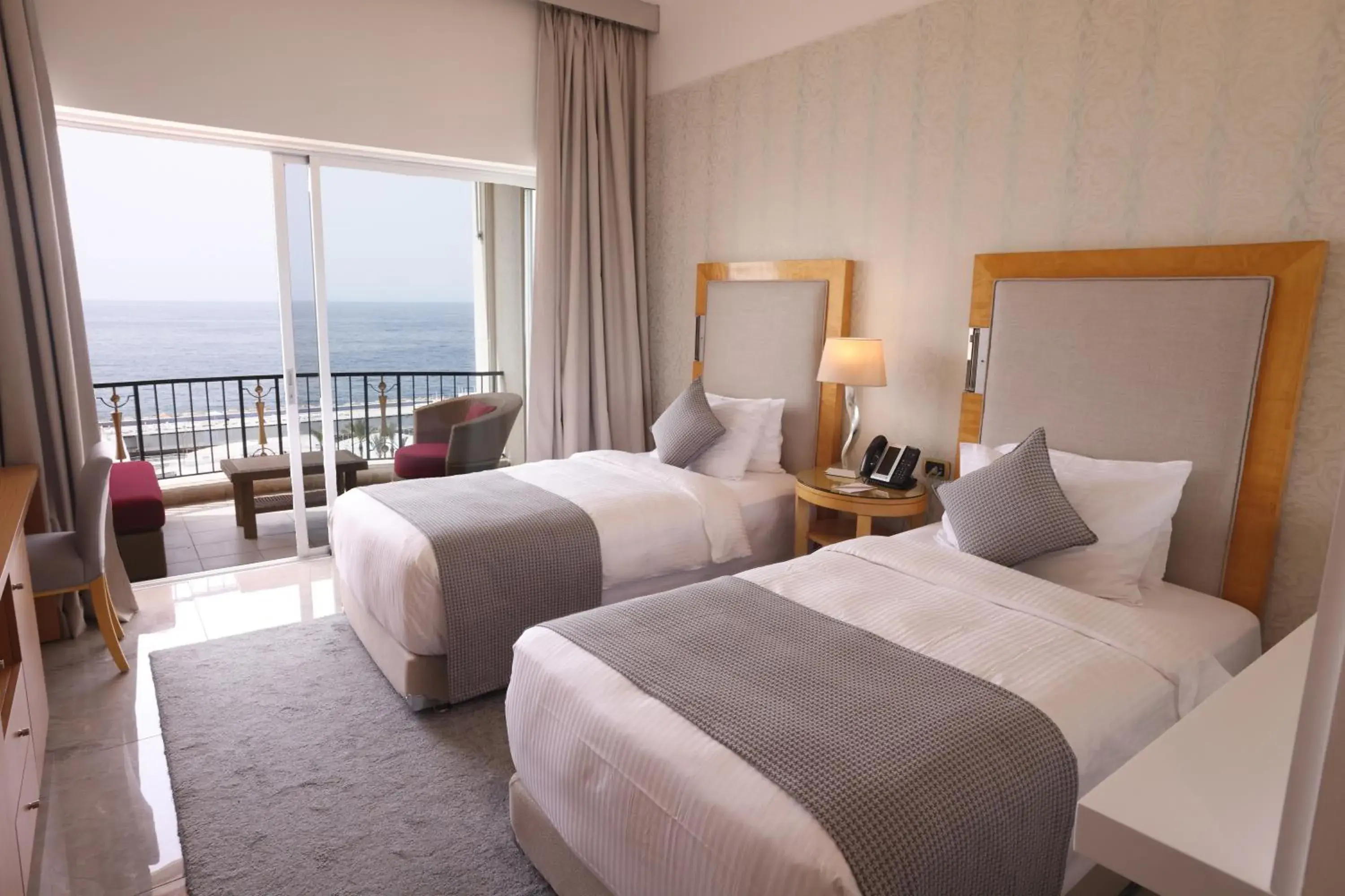 Balcony/Terrace, Bed in Riviera Hotel and Beach Lounge, Beirut
