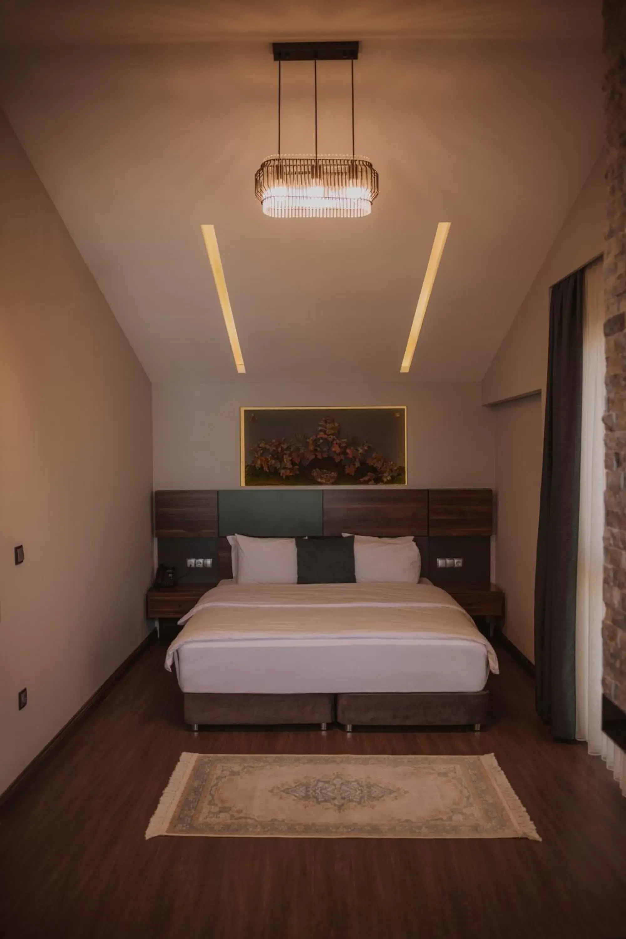 Bed in Peerless Villas Hotel