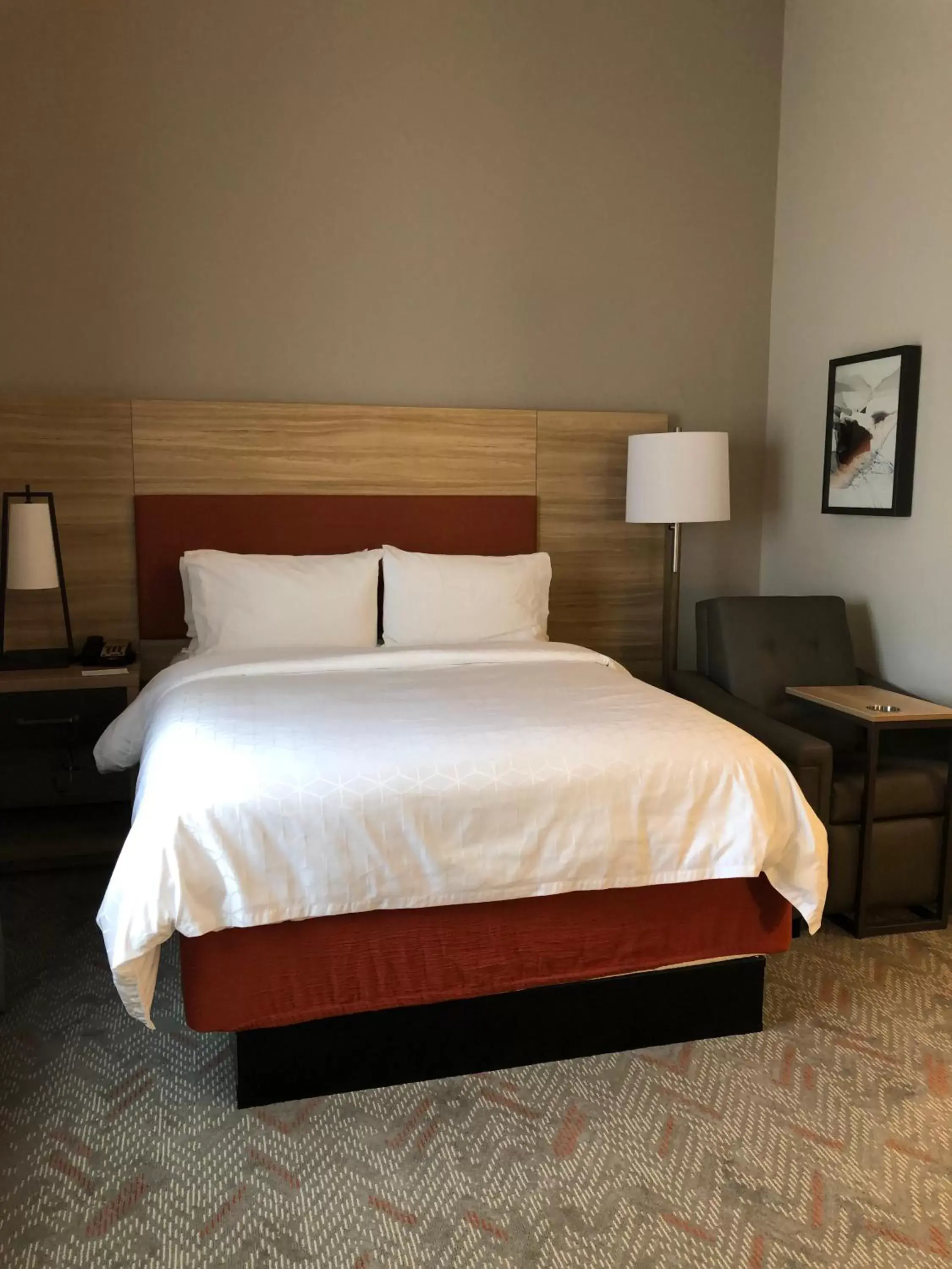 Bed in Candlewood Suites Mount Pleasant, an IHG Hotel