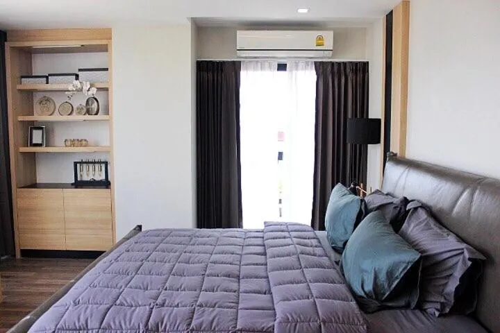 Bed in Wellness Chiang Mai Hotel