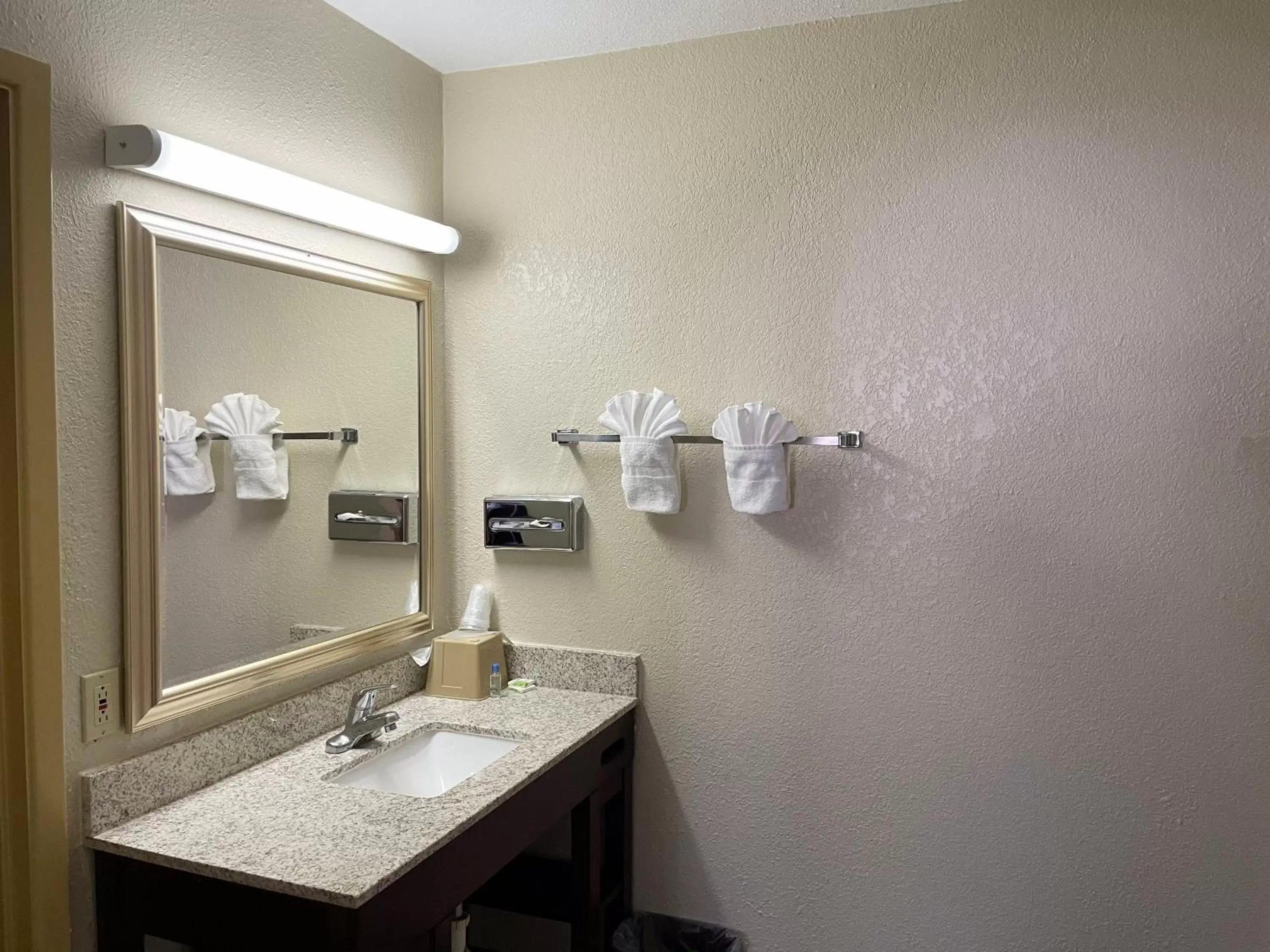 Bathroom in Great Western Inn & Suites