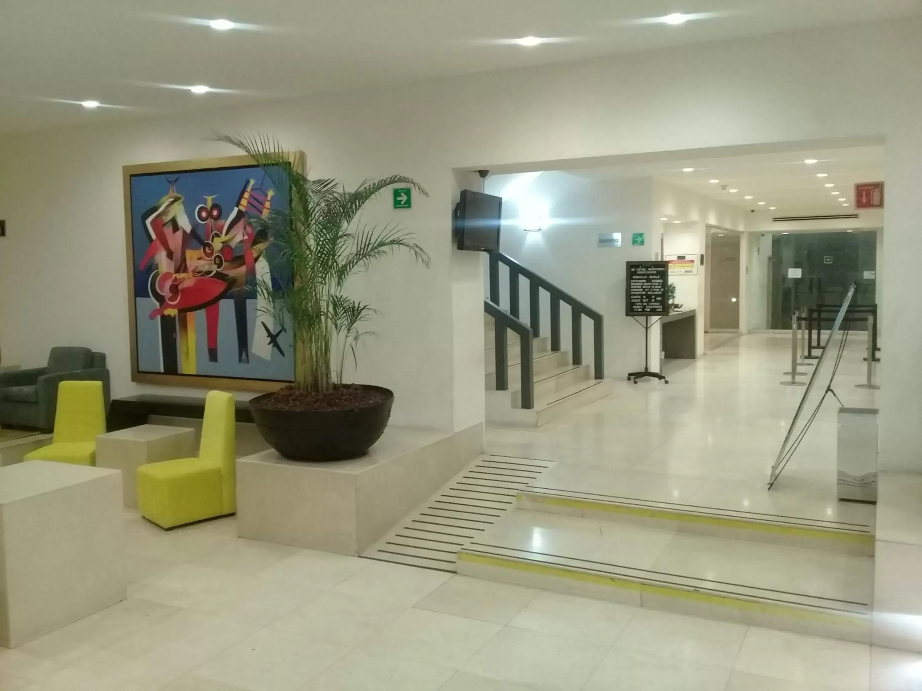 Lobby or reception in We Hotel Aeropuerto