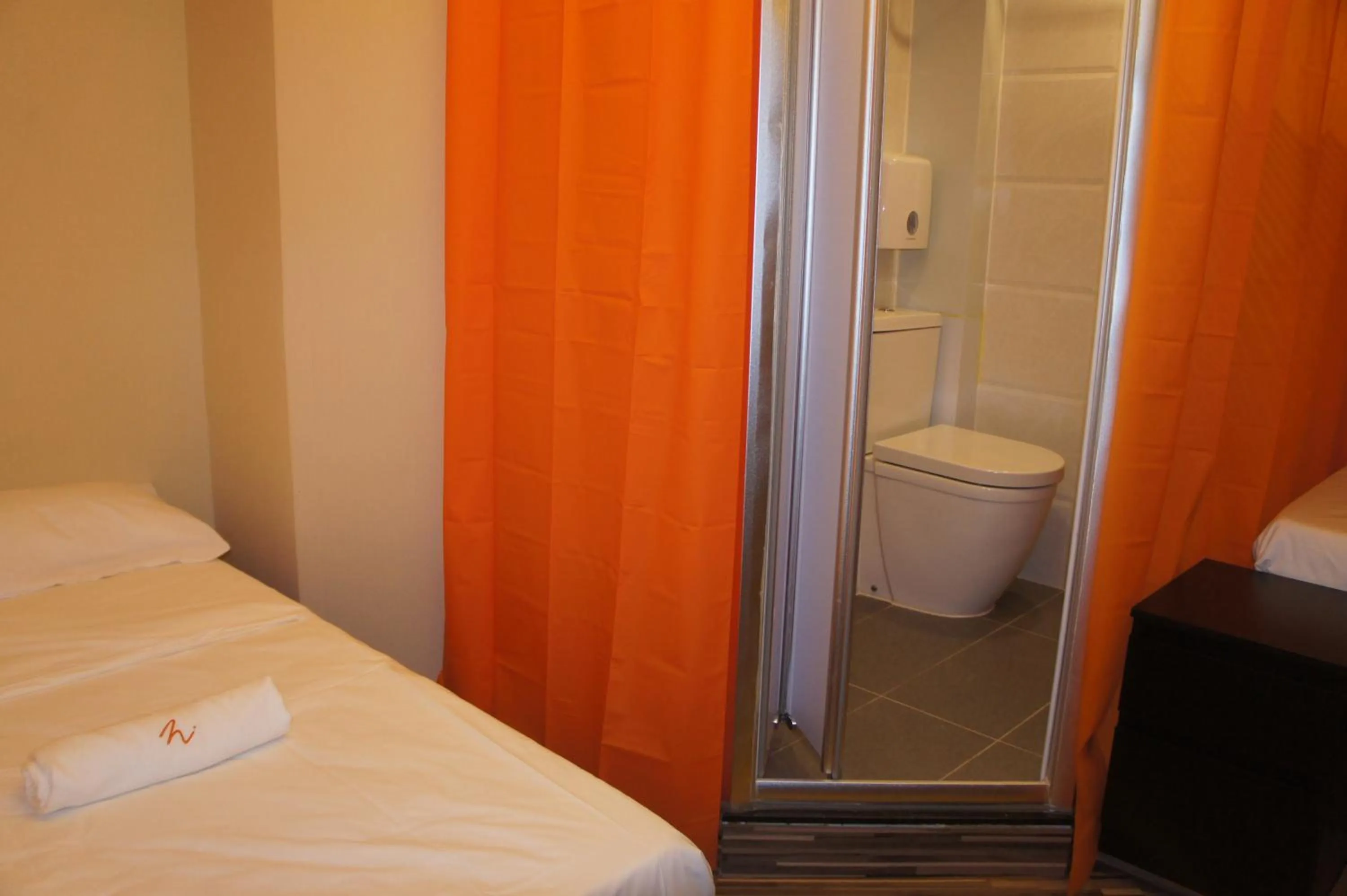 Toilet, Bed in Homy Inn North Point